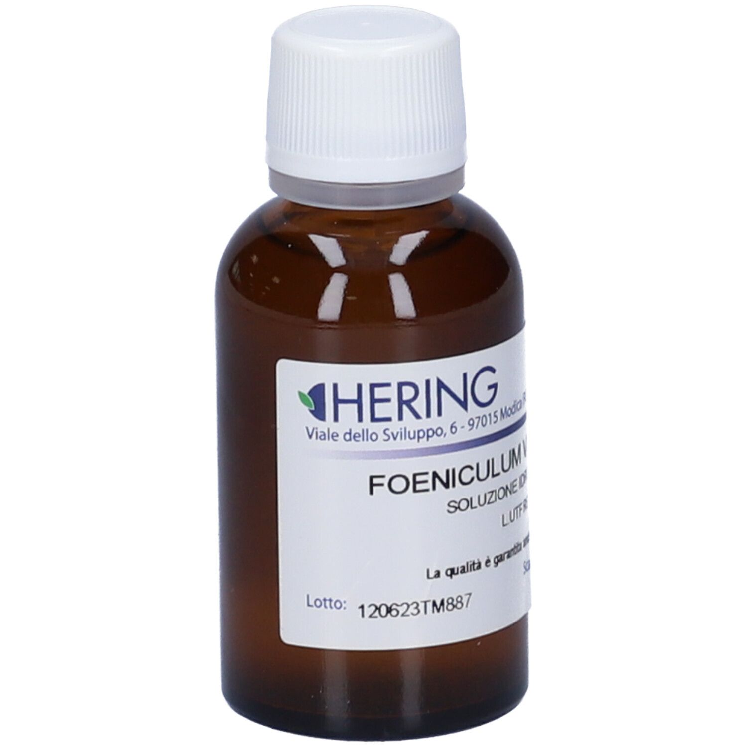 Flacone di vetro marrone con tappo bianco ed etichetta. Logo: Hering. Scritta: Foeniculum Vulgare. Numero di lotto e di serie.