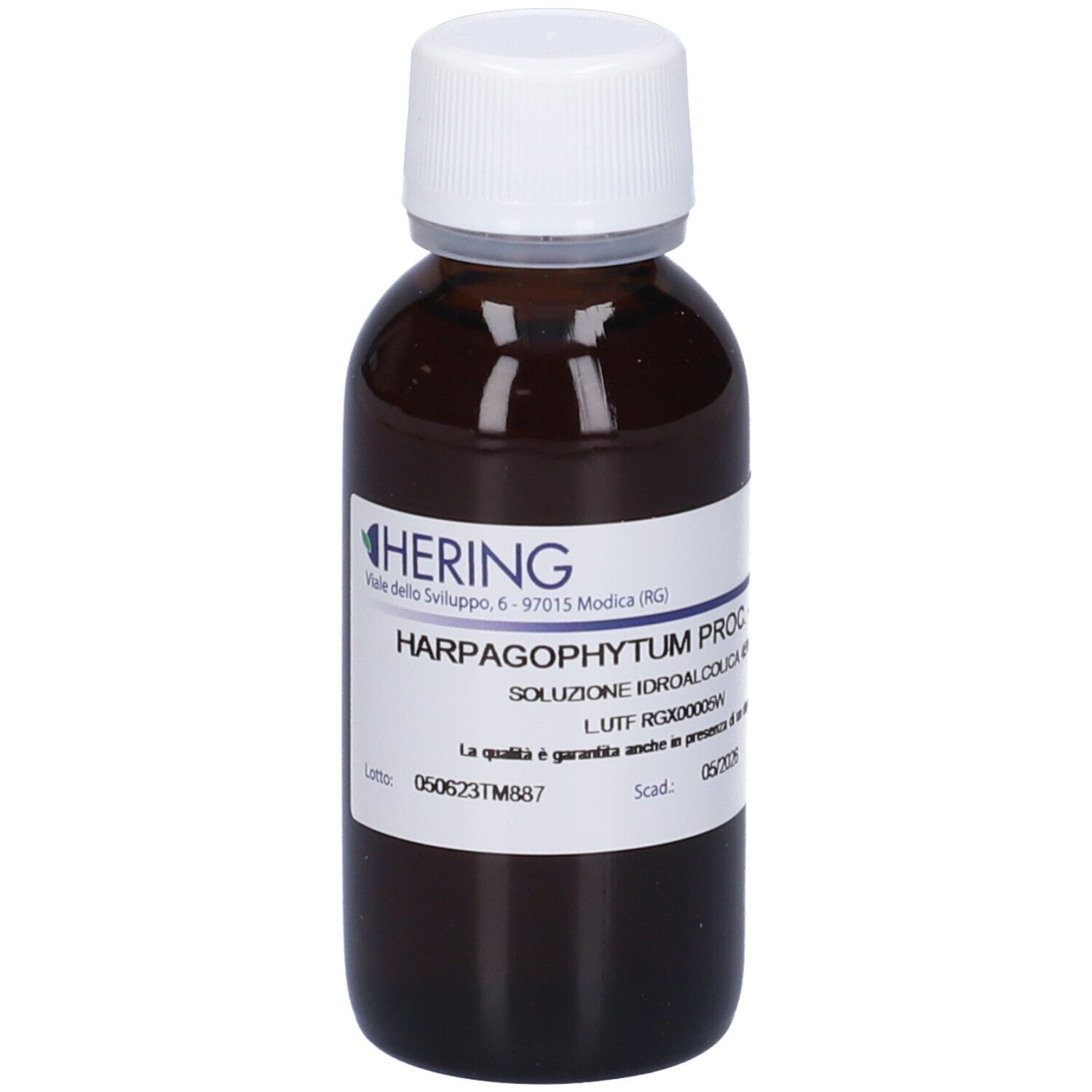 Flacone di vetro marrone con tappo bianco ed etichetta. Scritta: HARPAGOPHYTUM PROC. Marchio Hering.