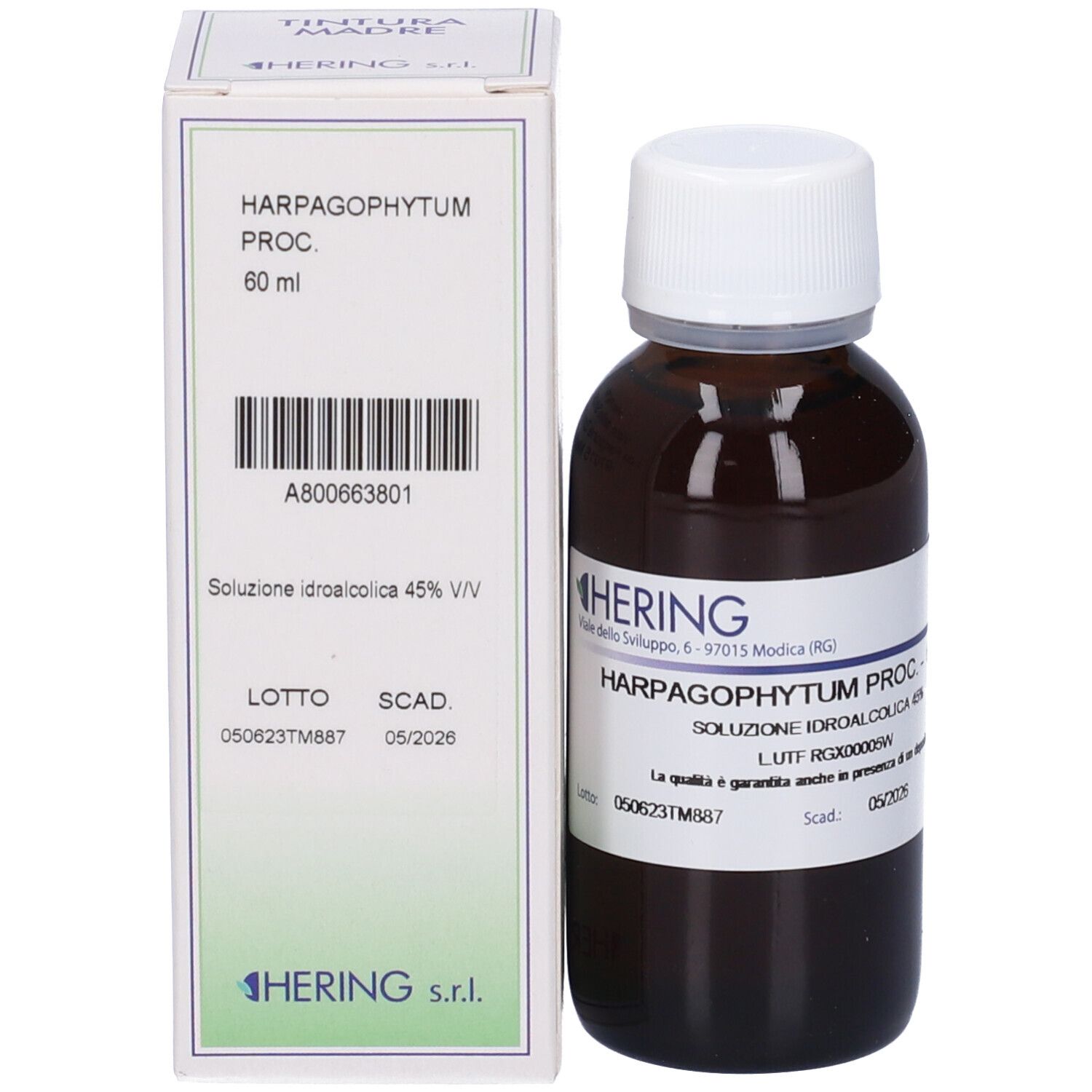 Flacone e scatola. Scatola con scritta: HARPAGOPHYTUM PROC. 60 ml. Marchio Hering.