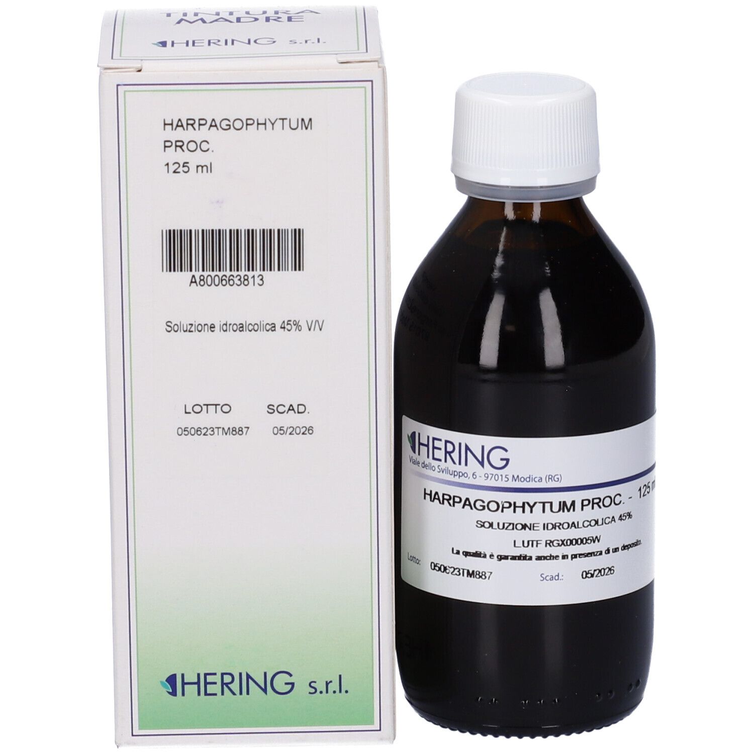 Flacone di vetro marrone con tappo bianco e scatola. Etichetta con testo. Logo HERING. Liquido.