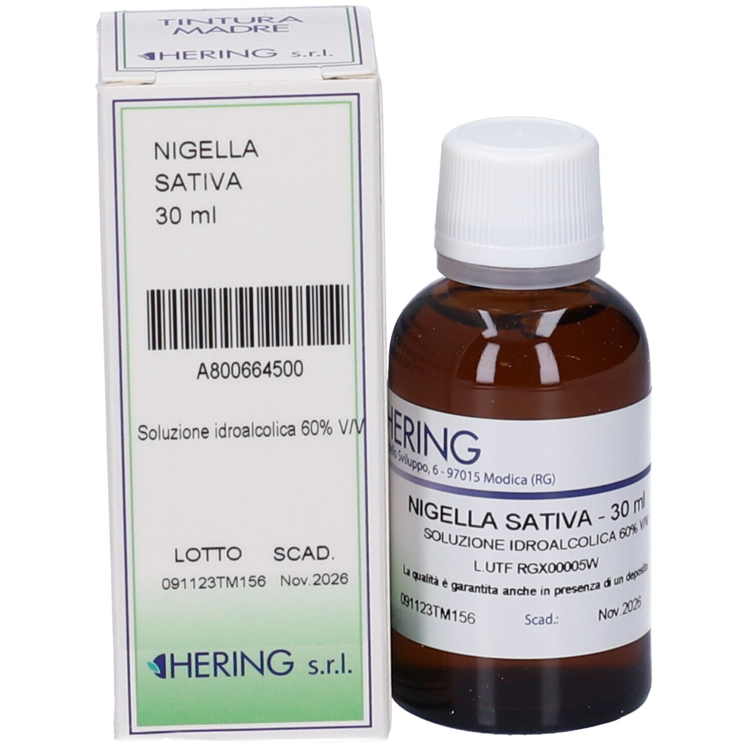 Flacone di vetro marrone e scatola. Scatola con testo: Nigella Sativa, 30 ml. Flacone con etichetta e testo.