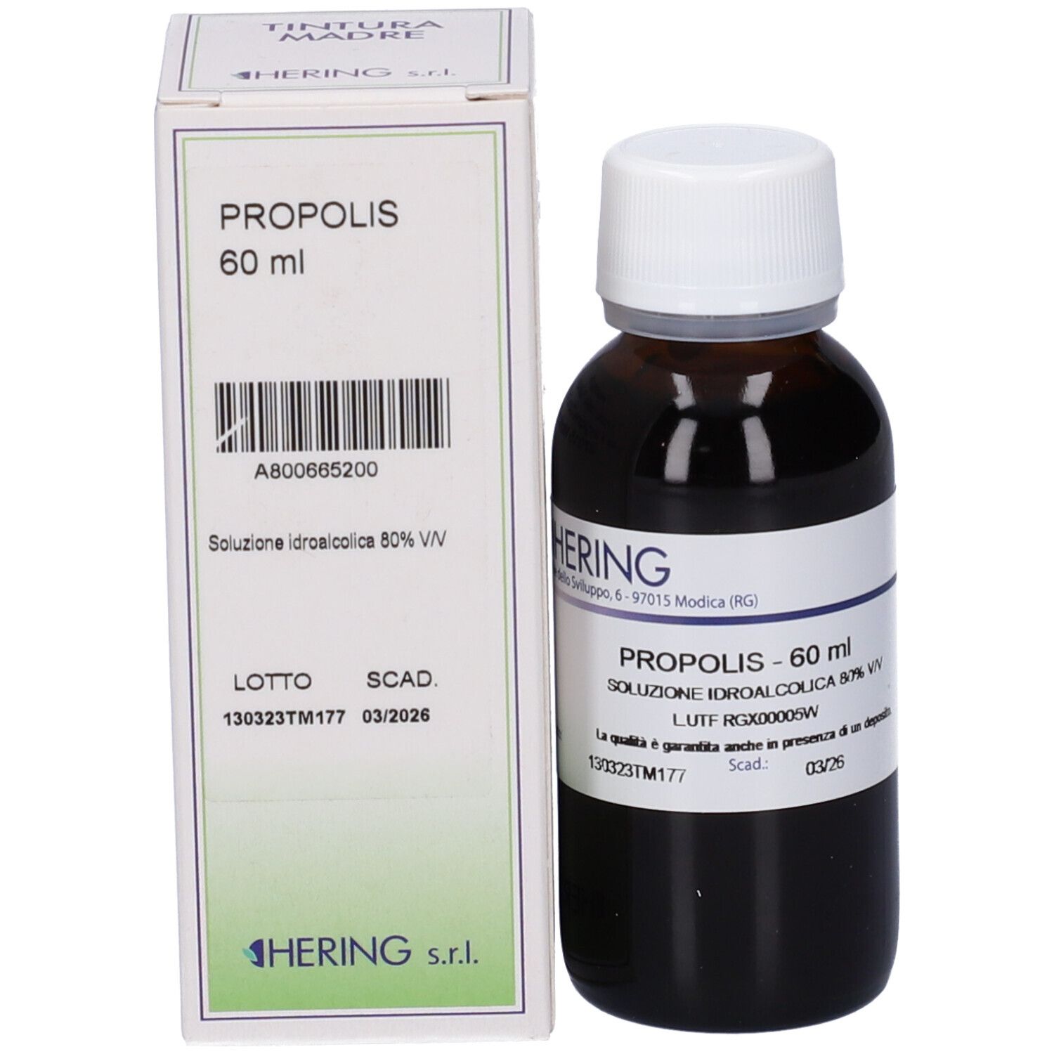 Flacone di vetro marrone e scatola. Flacone: PROPOLIS, 60 ml, soluzione, 80% V/V. Scatola: PROPOLIS, 60 ml. Marchio HERING.