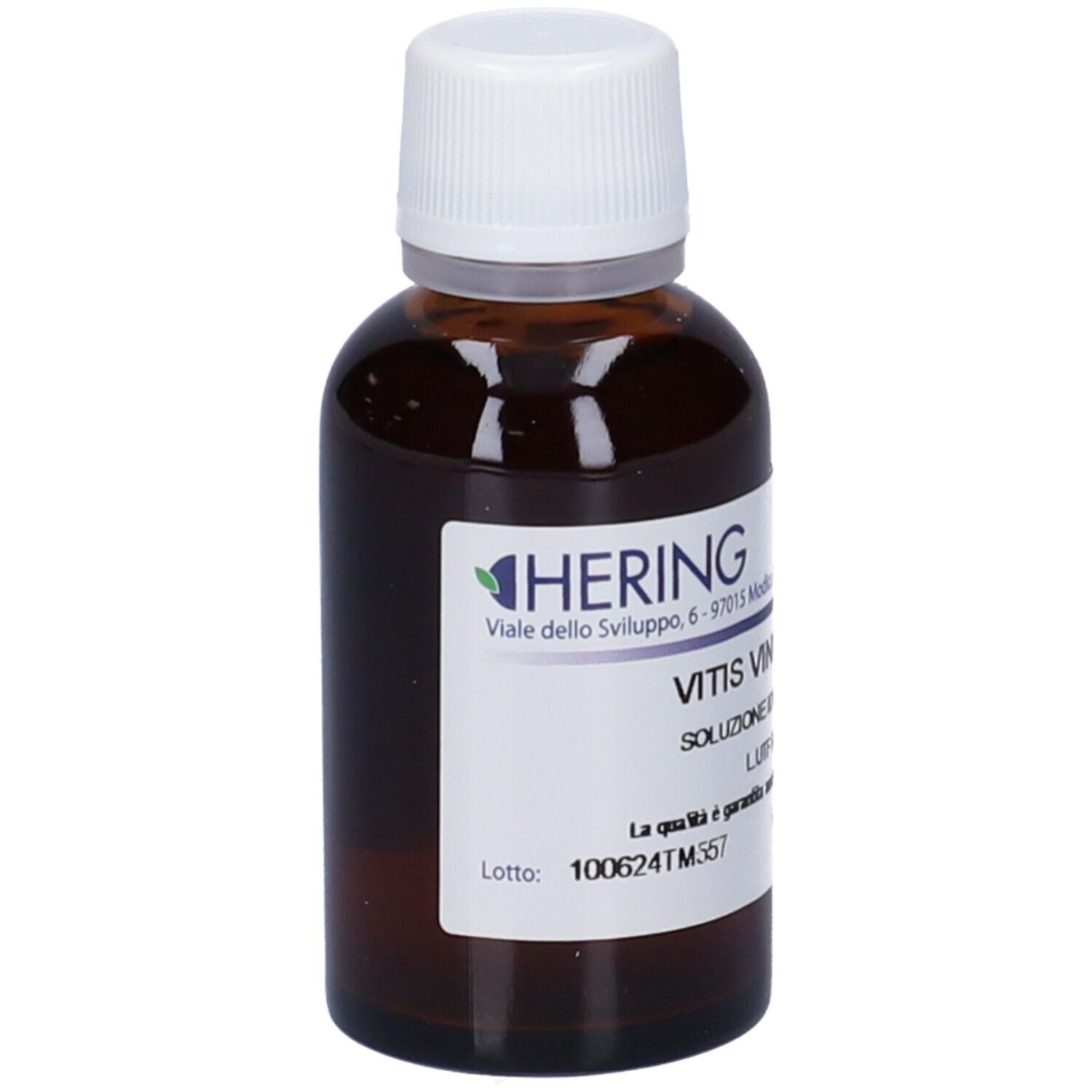 Flacone di vetro marrone con tappo bianco. Etichetta con testo: Vitis Vinifera. Marchio: HERING. Stampa: 100624TM357.