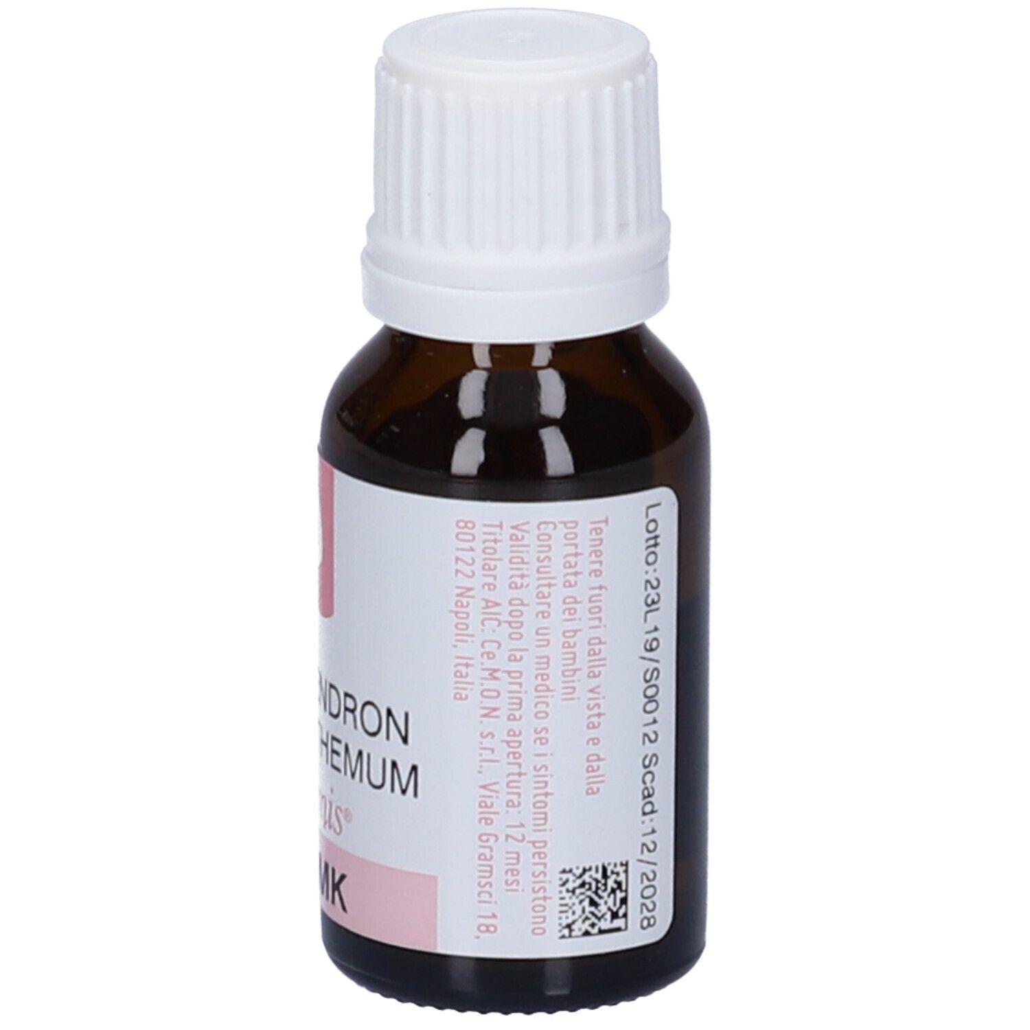 Flacone di vetro marrone con tappo bianco. Etichetta con testo e accenti rosa. Indirizzo del produttore.