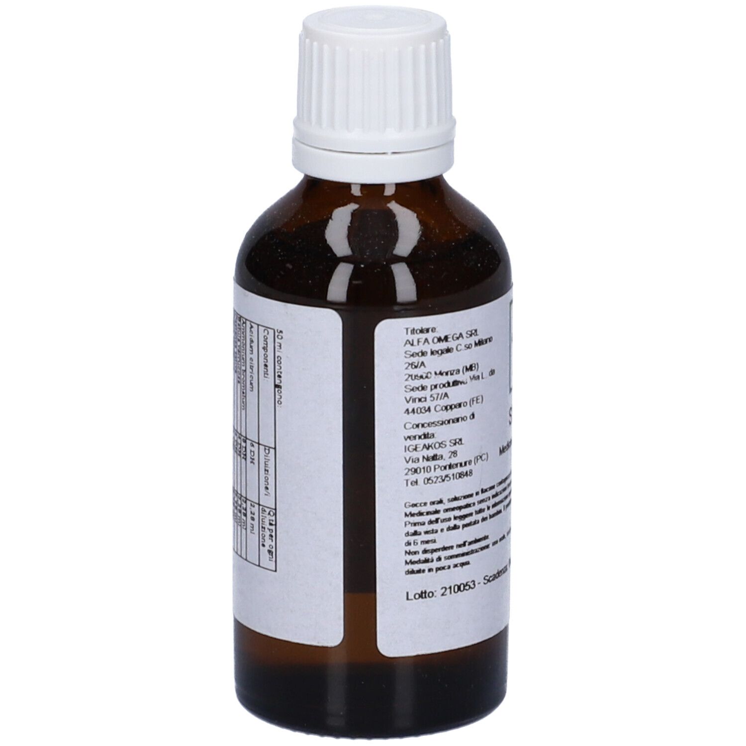 Vista posteriore di un flacone di vetro marrone con tappo bianco. Etichetta con testo.