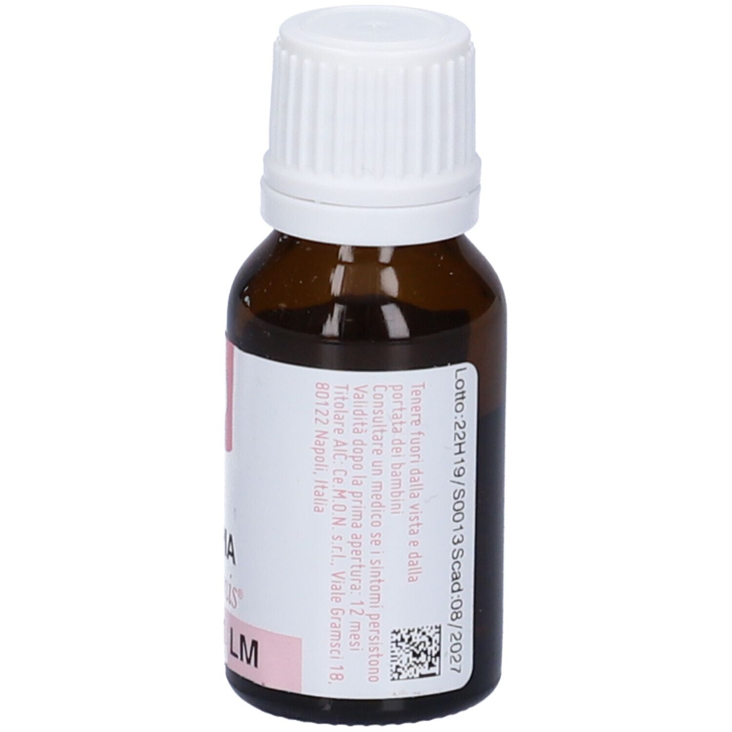 Flacone di vetro marrone con tappo bianco. Etichetta con testo e accenti rosa. 10 ml.