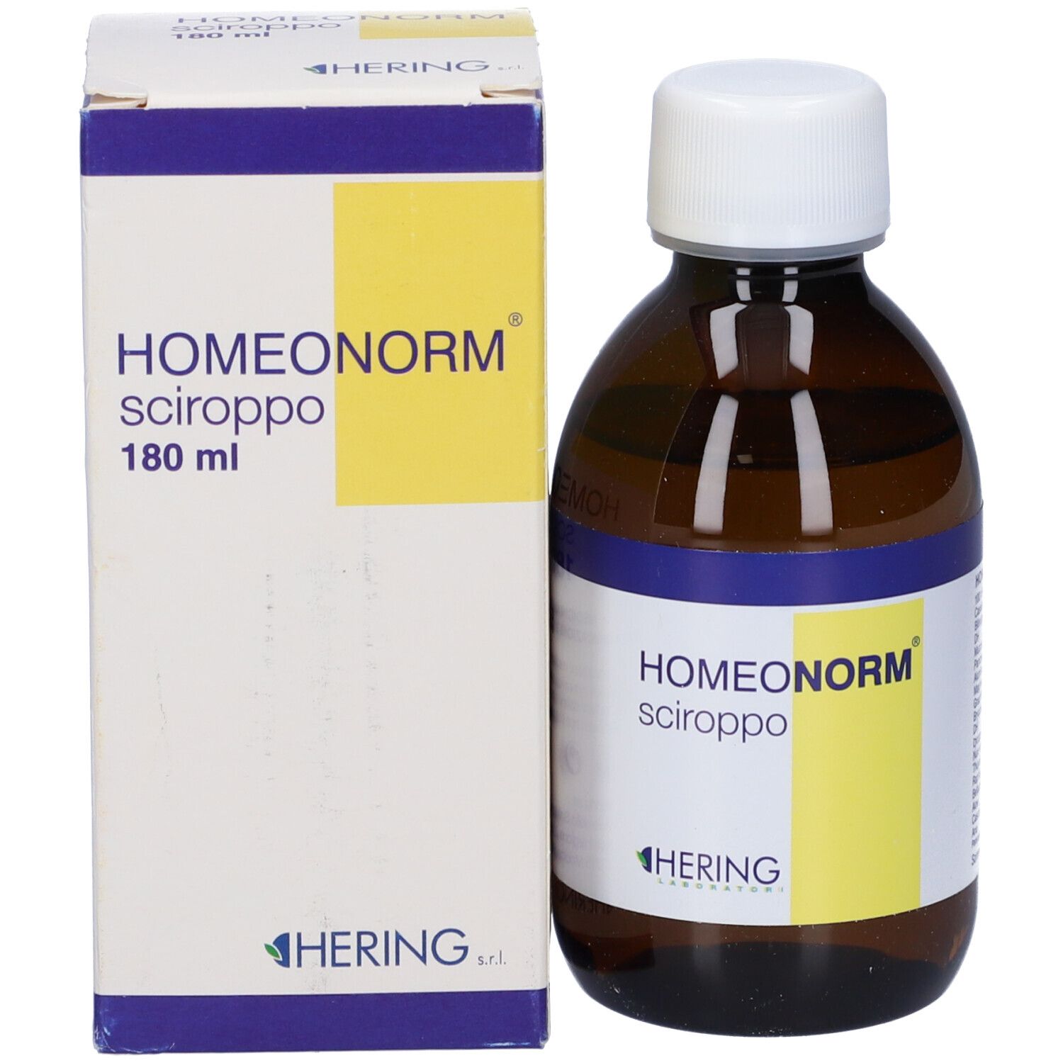 Flacone di vetro marrone e scatola con HOMEONORM Sciroppo. Scritta: HERING. Etichetta gialla. 180 ml.