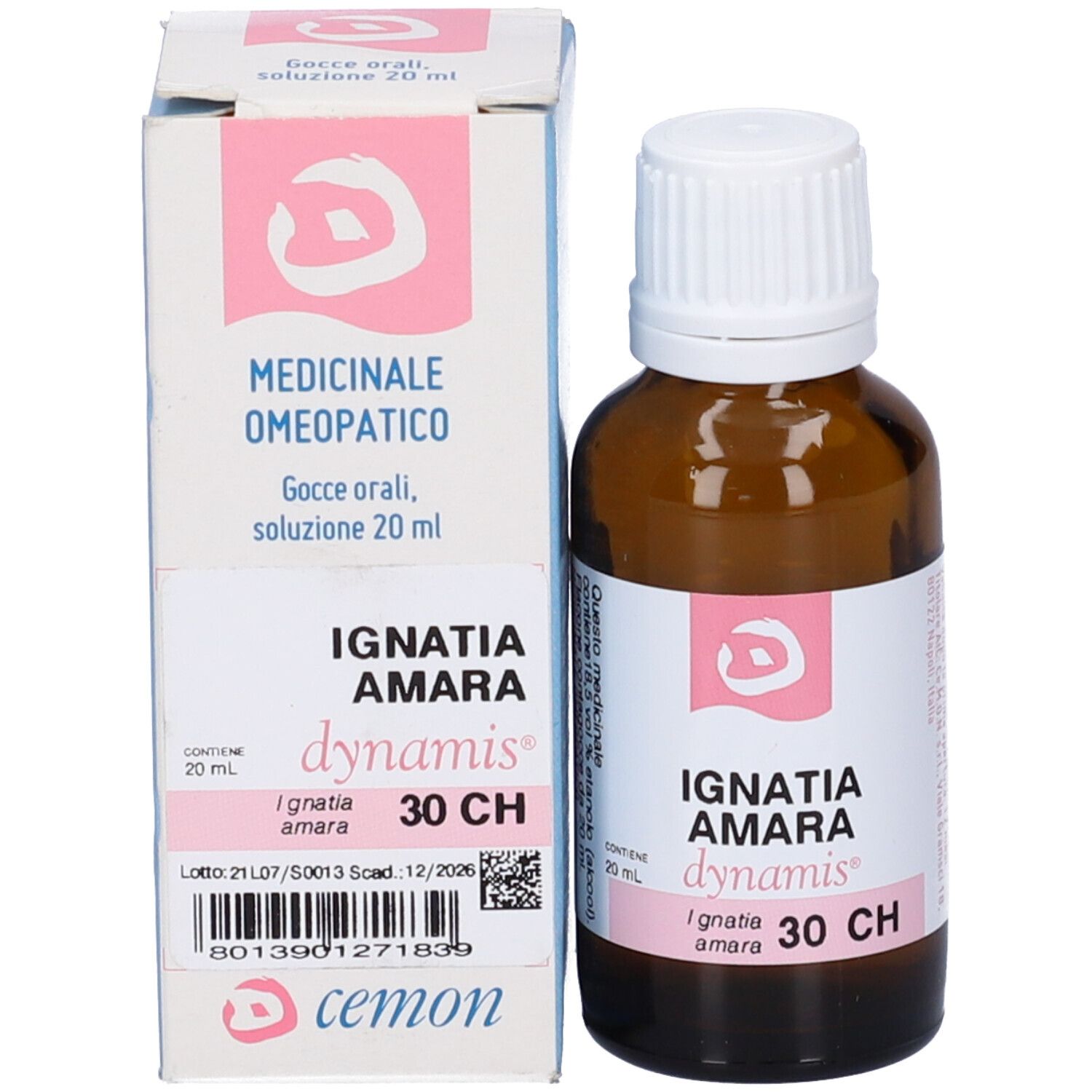 Flacone in vetro marrone con tappo bianco ed etichetta rosa. Accanto, una scatola.