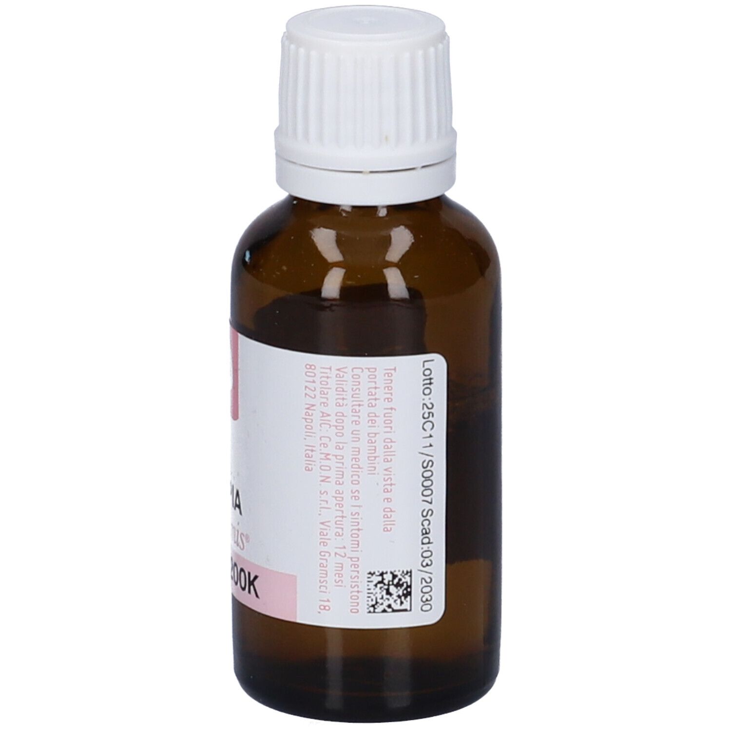 Flacone di vetro marrone con tappo bianco. Etichetta con testo e accenti rosa. Contiene 20 ml.