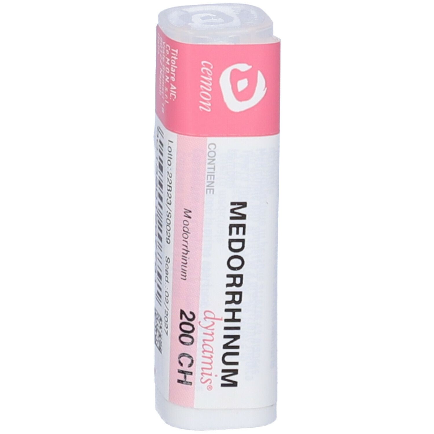 Confezione cilindrica. Etichetta rosa con testo bianco: Medorrhinum 200 CH, dynamis. Coperchio bianco.