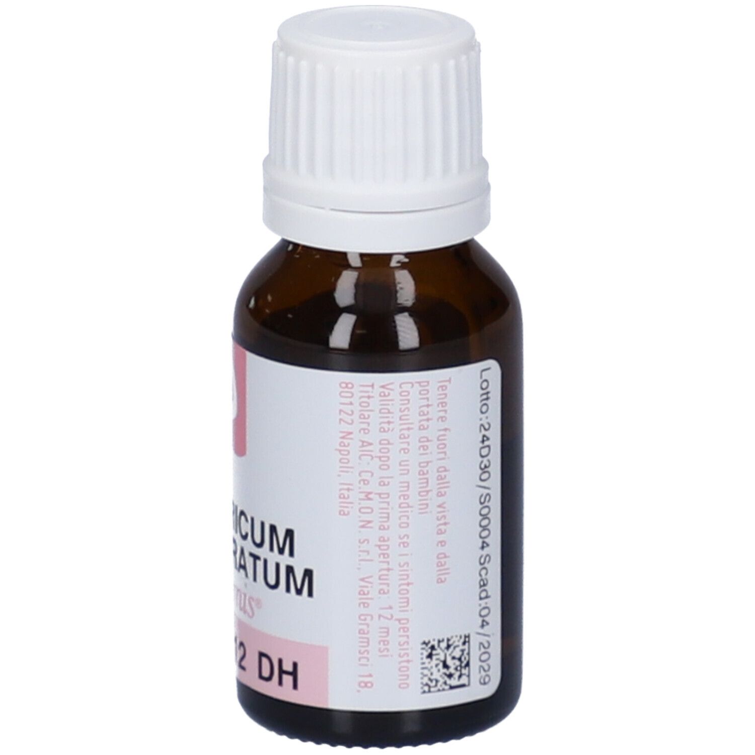 Flacone di vetro marrone con tappo bianco. Etichetta con testo, numero di lotto e data di scadenza.