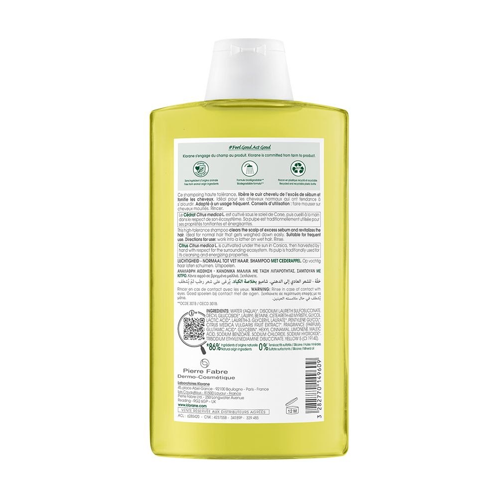 Retro del flacone di shampoo Klorane giallo. Testo multilingue. Codice QR e logo riciclo.