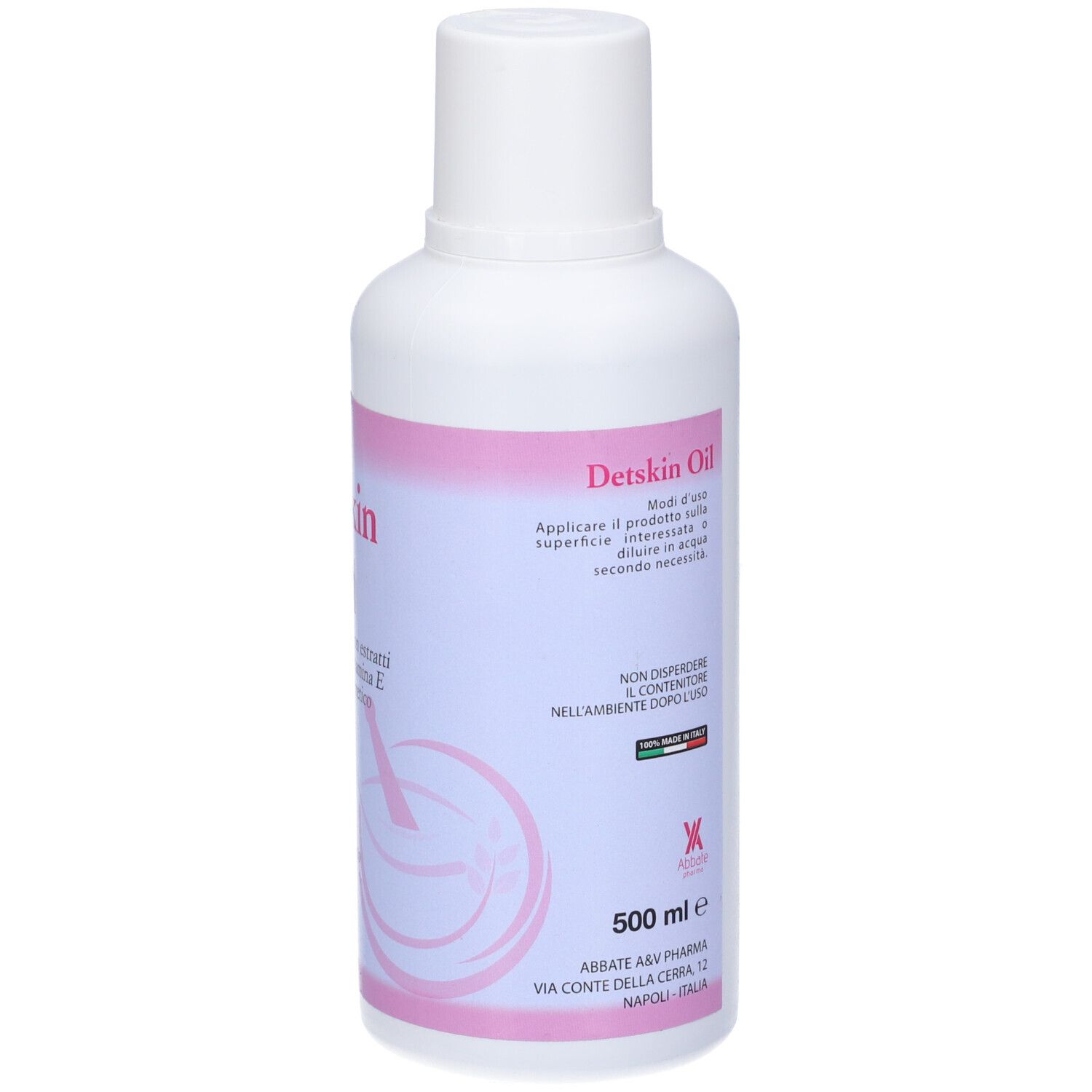 Flacone bianco con etichetta rosa. Scritta: Detskin Oil. 500 ml. Istruzioni sul retro.
