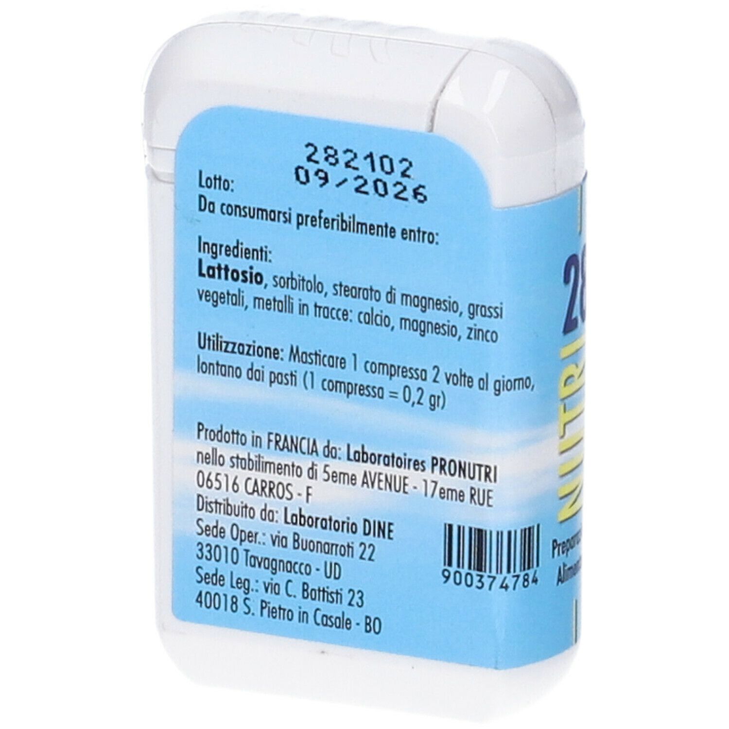 Retro di una scatola bianca di compresse con etichetta blu. Scritto: Ingredienti, scadenza, informazioni produttore.