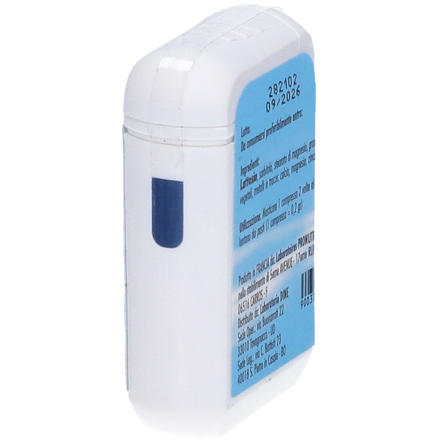 Scatola bianca di compresse con etichetta blu. Scritto: Ingredienti, scadenza, informazioni produttore.