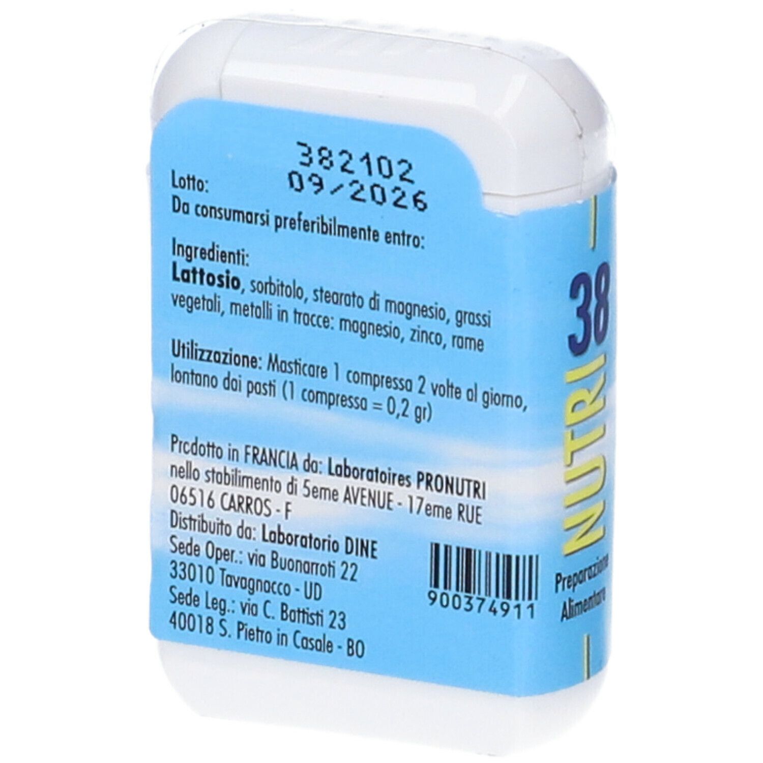 Scatola bianca per compresse con etichetta blu. Scritta: NUTRI 38, figura gialla. Retro con informazioni e data di scadenza.