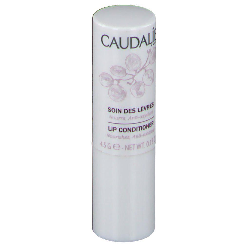 Stick per labbra bianco con testo. Sulla confezione è presente il marchio "CAUDALIE" e "SOIN DES LEVRES LIP CONDITIONER".