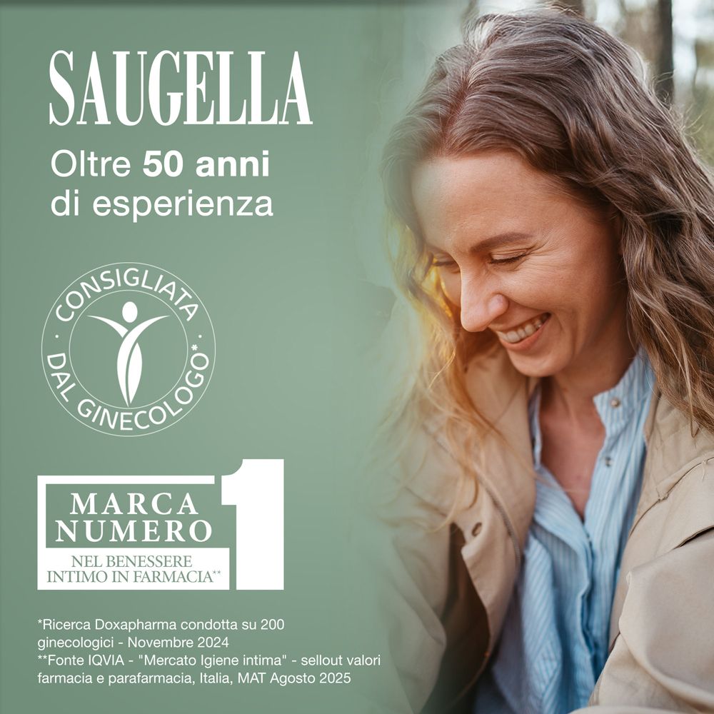Donna sorridente. SAUGELLA. Oltre 50 anni di esperienza. Consigliata da ginecologi. Marchio n.1.
