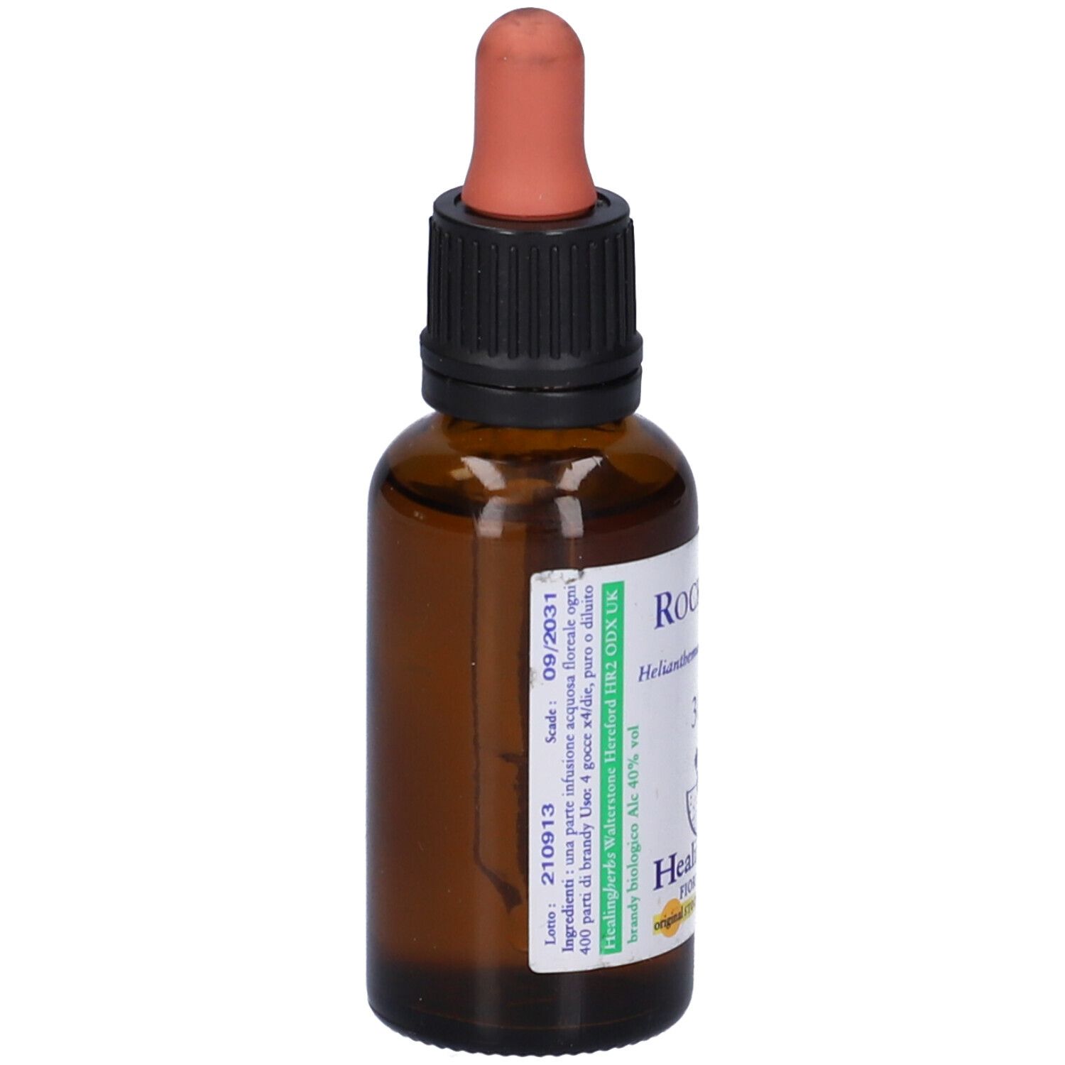 Vista posteriore di un flacone di vetro marrone con tappo nero e pipetta. Etichetta con ingredienti e data di scadenza.