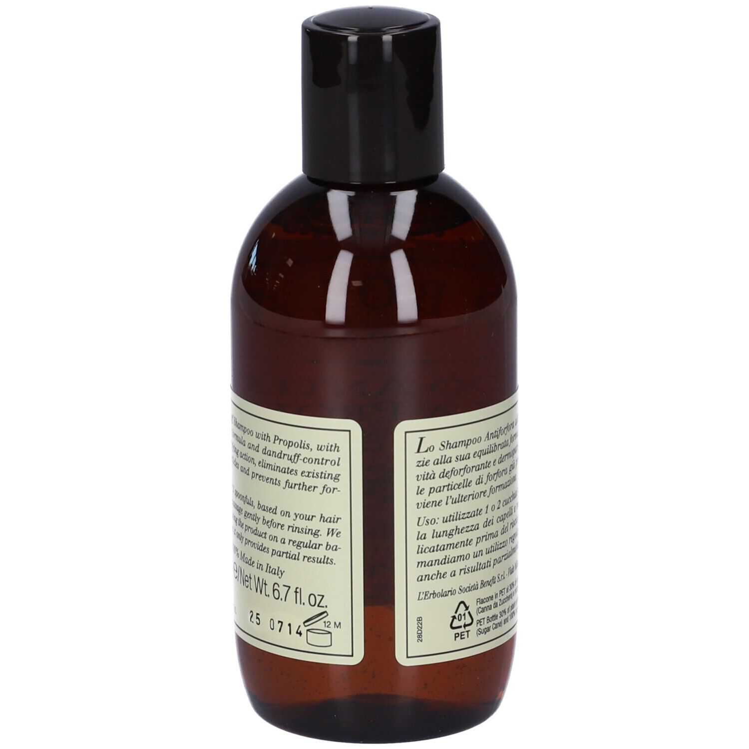 Flacone marrone di shampoo con tappo nero ed etichetta con testo e illustrazione botanica.