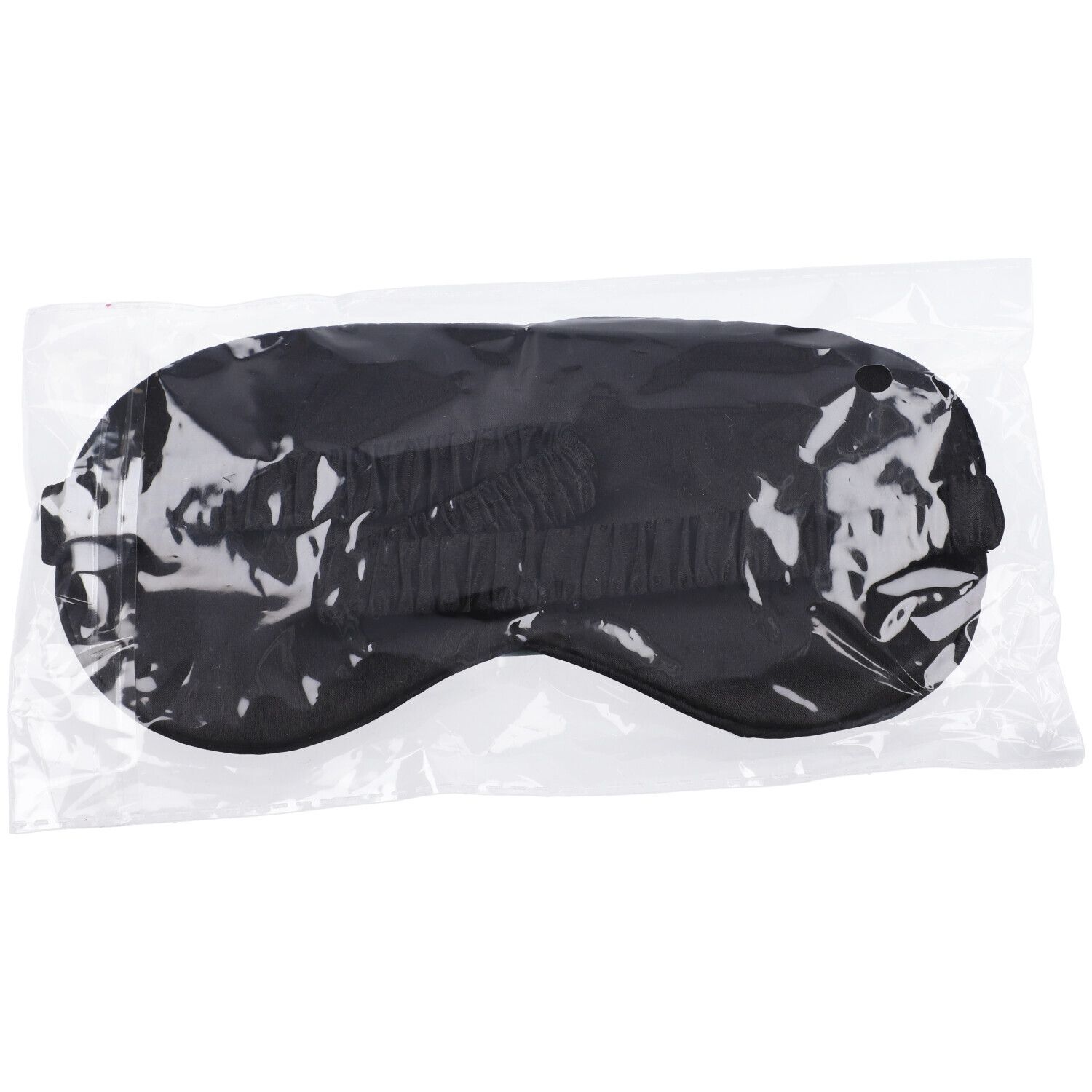 Maschera da riposo nera in confezione trasparente. Fascia elastica visibile.