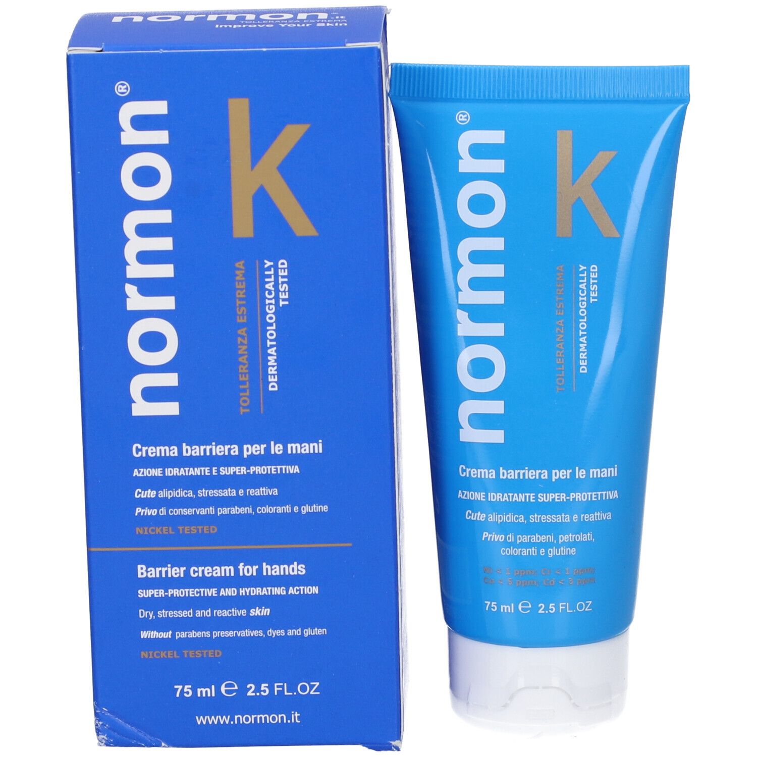 Scatola e tubo blu. Scritta: Normon K, Crema Barriera per le mani. Dermatologicamente testato. Testato al nichel.