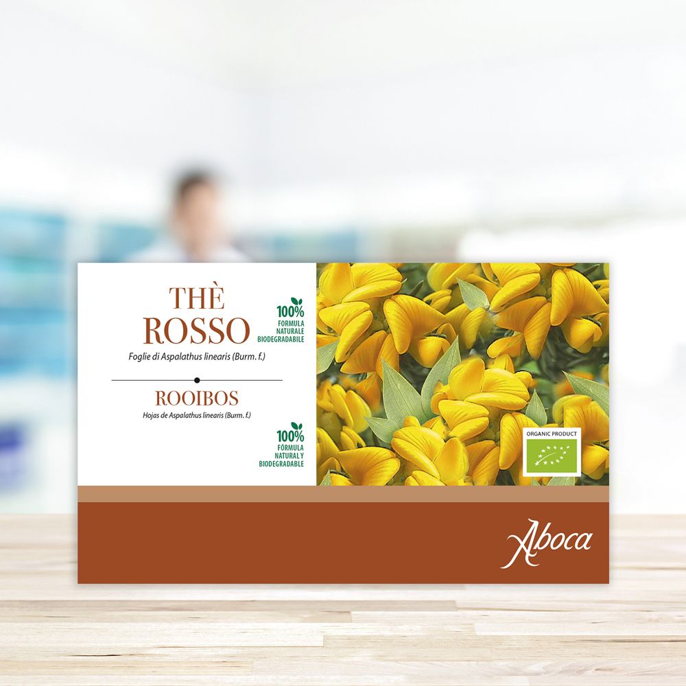 Confezione di "Thè Rosso" e "Rooibos". Logo Aboca. Immagine di fiori gialli. Certificazione biologica.