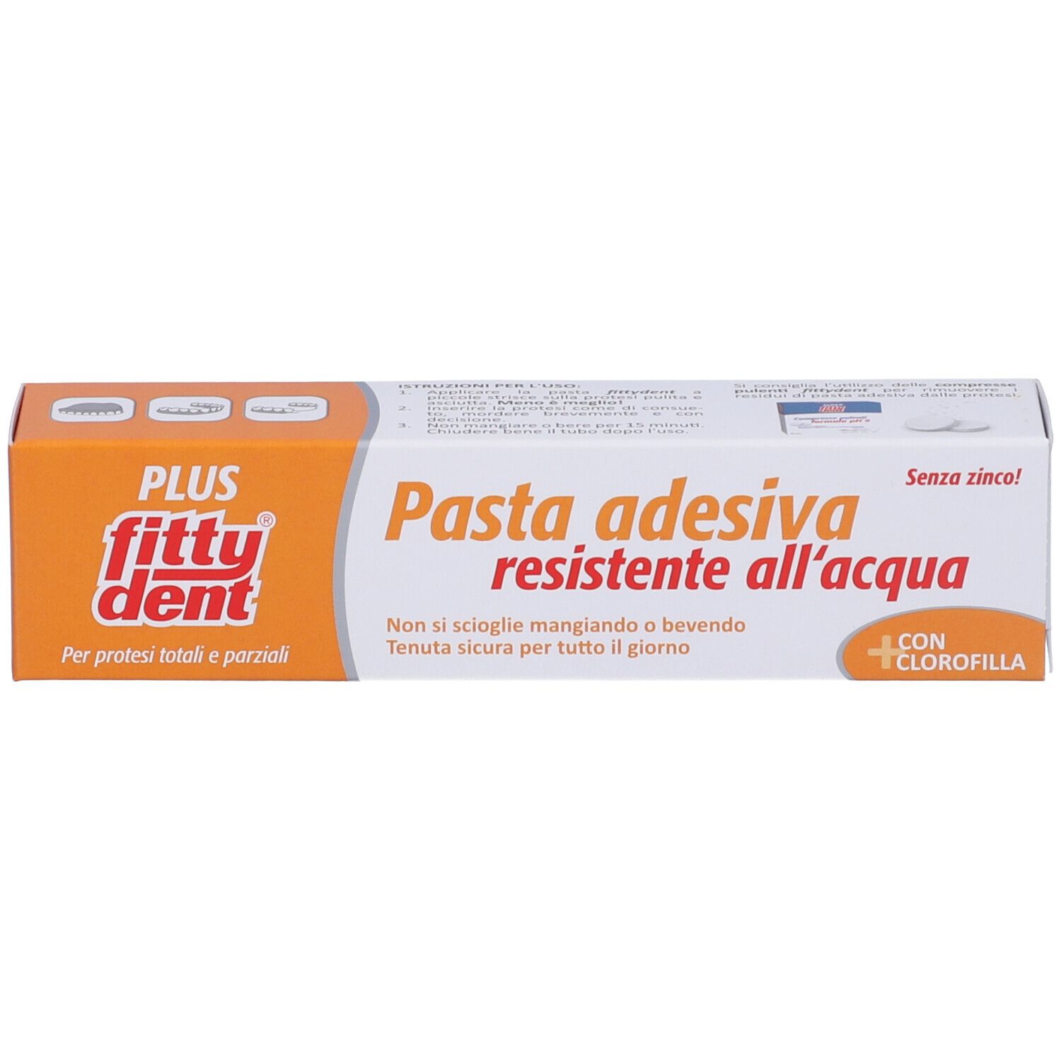 Fitty Dent Plus Pasta Adesiva per protesi. Confezione arancione e bianca. Testo: Pasta adesiva resistente all'acqua. Con Clorofilla. Senza zinco!