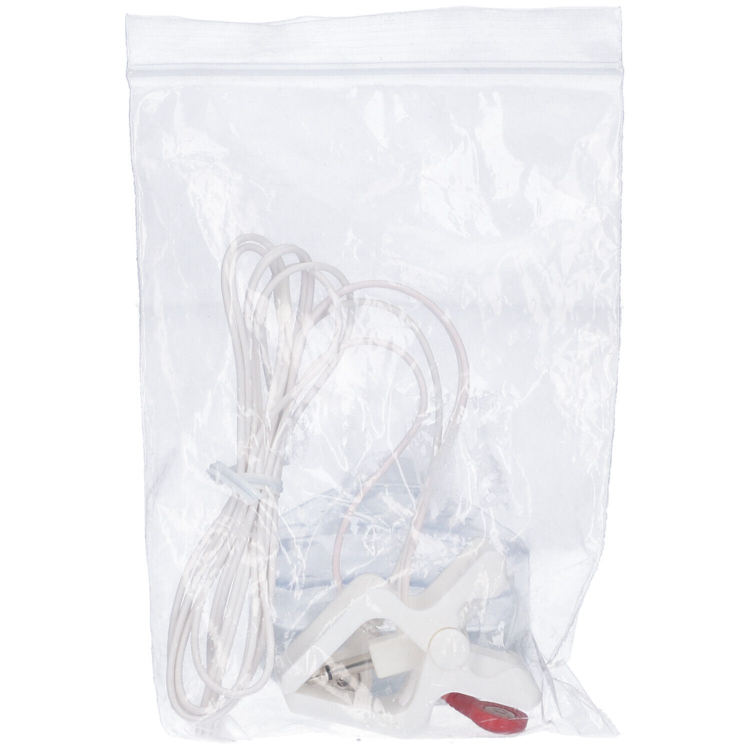 Cavi e clip in sacchetto di plastica. Cavi bianchi, clip bianca con dettaglio rosso.