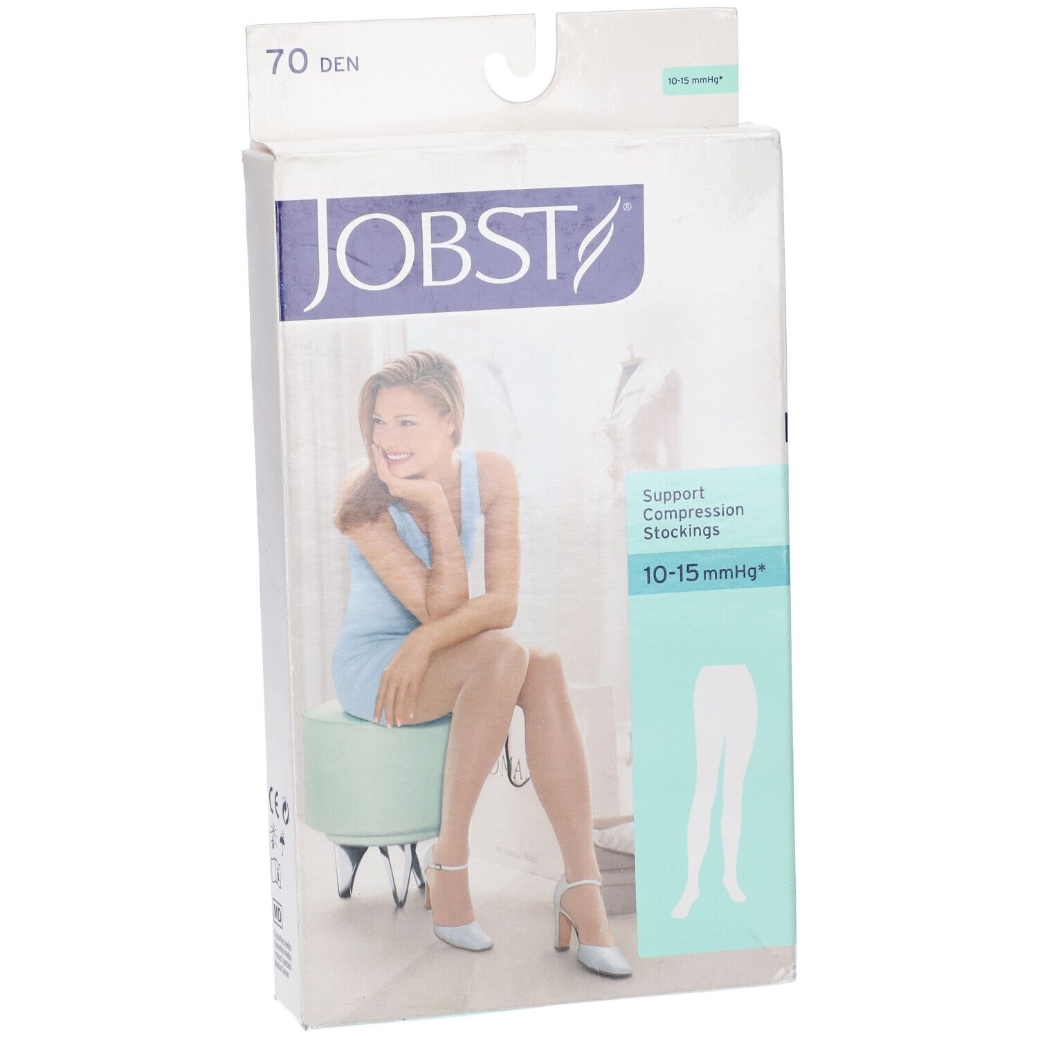 Confezione calze compressive JOBST Ultrasheer. 10-15 mmHg, 70 DEN. Donna con calze sulla confezione. Logo JOBST visibile.