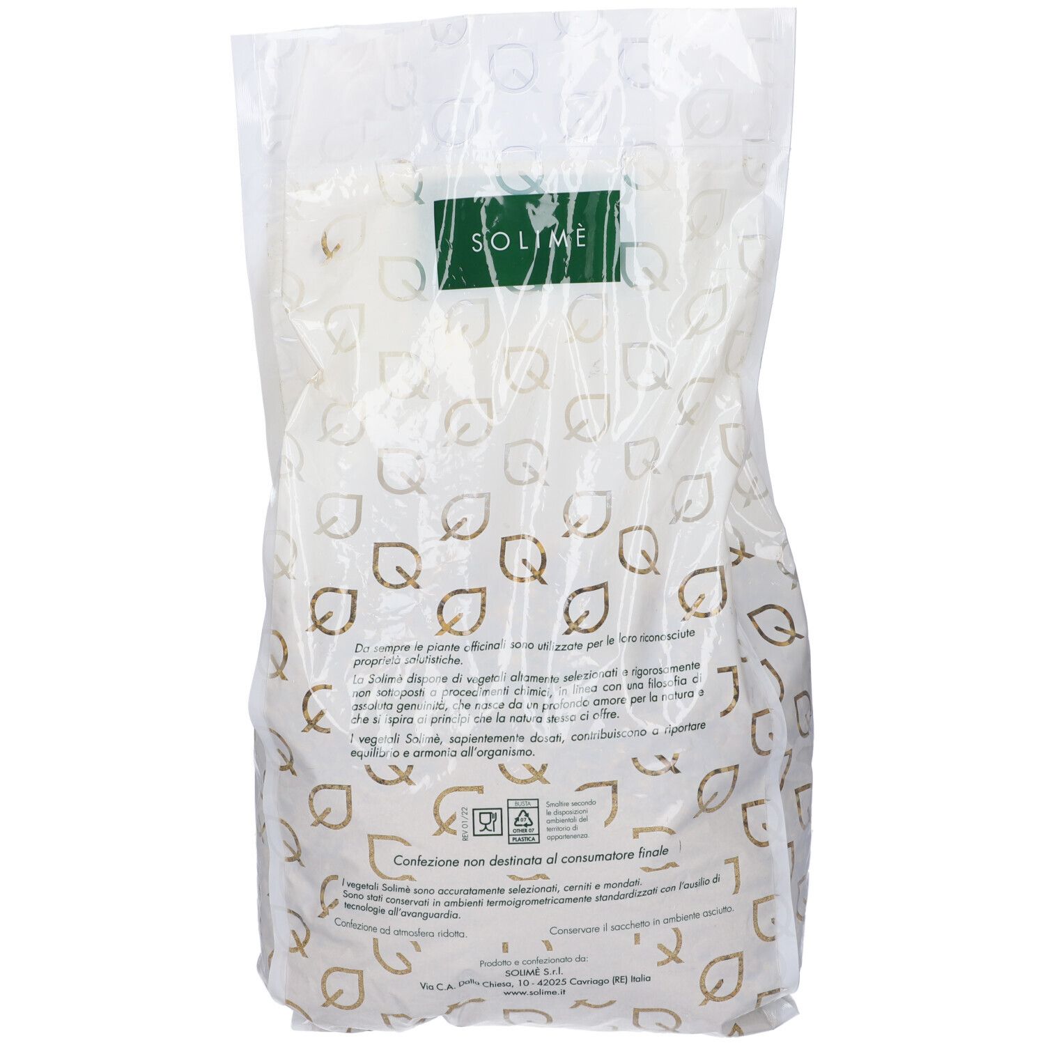 Retro del sacchetto di Camomilla Volg Capolini Int1Kg. Testo e loghi. Confezione trasparente con motivo a foglie.