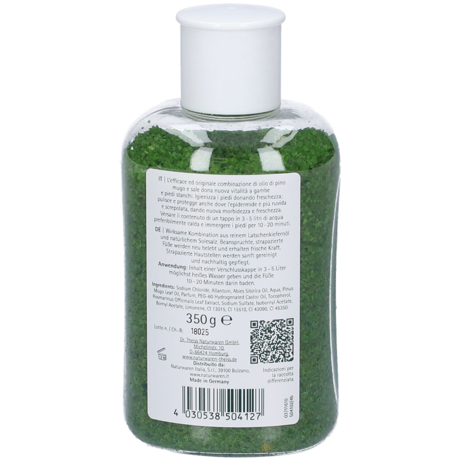 Retro di una bottiglia con cristalli verdi. Etichetta con testo, ingredienti e informazioni.