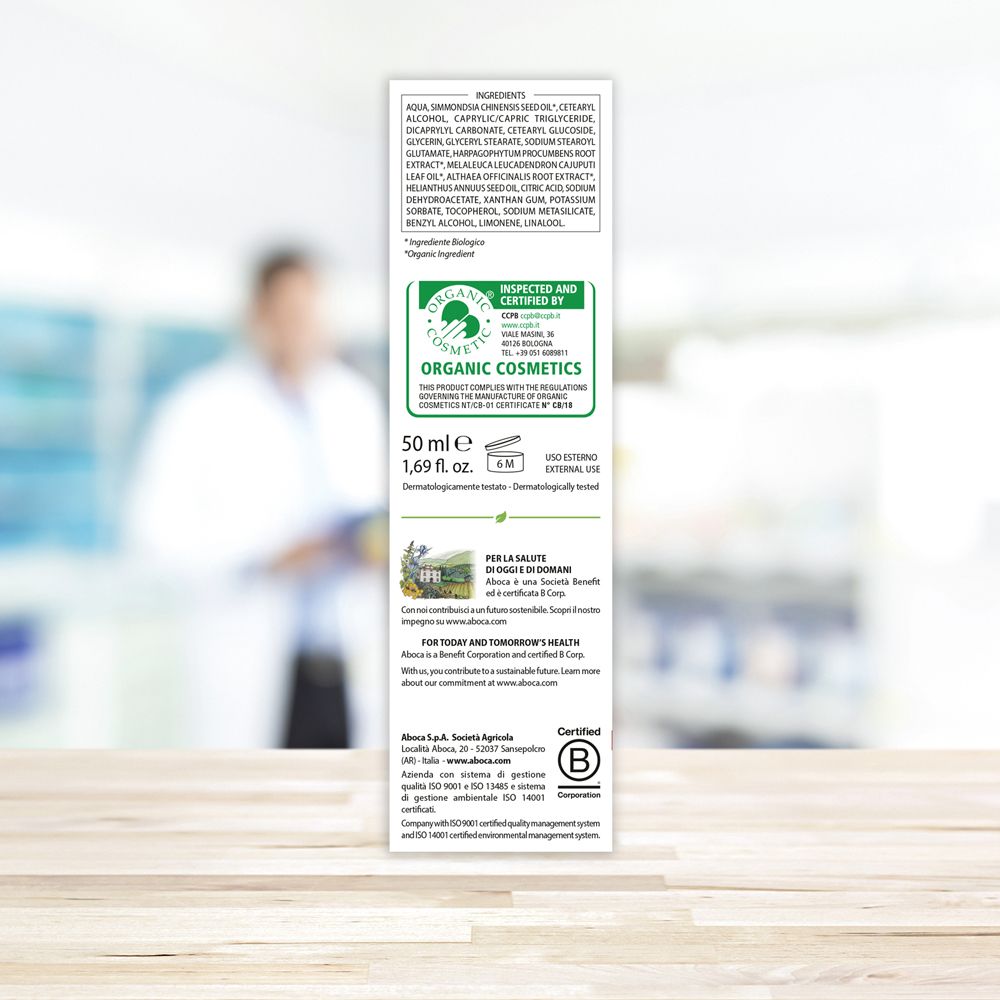 Retro della scatola con ingredienti, certificazioni e logo "Organic Cosmetic". Testo in italiano.