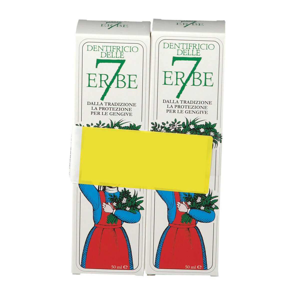 Due scatole di dentifricio "7 Erbe". Testo italiano. Adesivo giallo che copre il testo. Illustrazione di una donna con fiori.