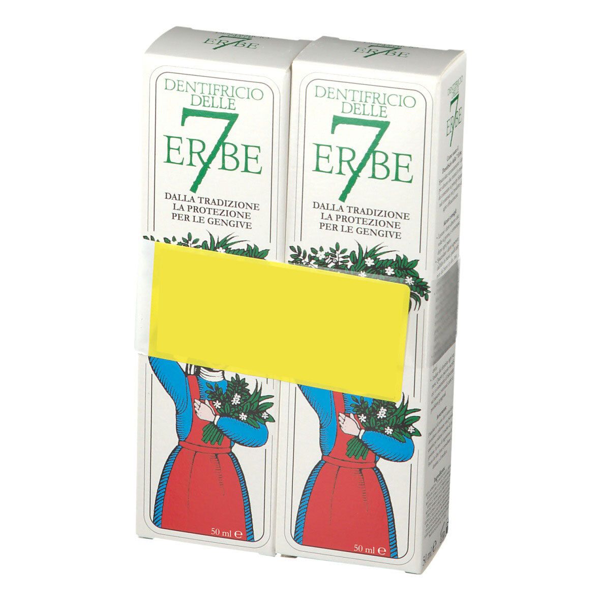 Due scatole di dentifricio "7 Erbe". Testo italiano. Adesivo giallo che copre il testo. Illustrazione di una donna con fiori.