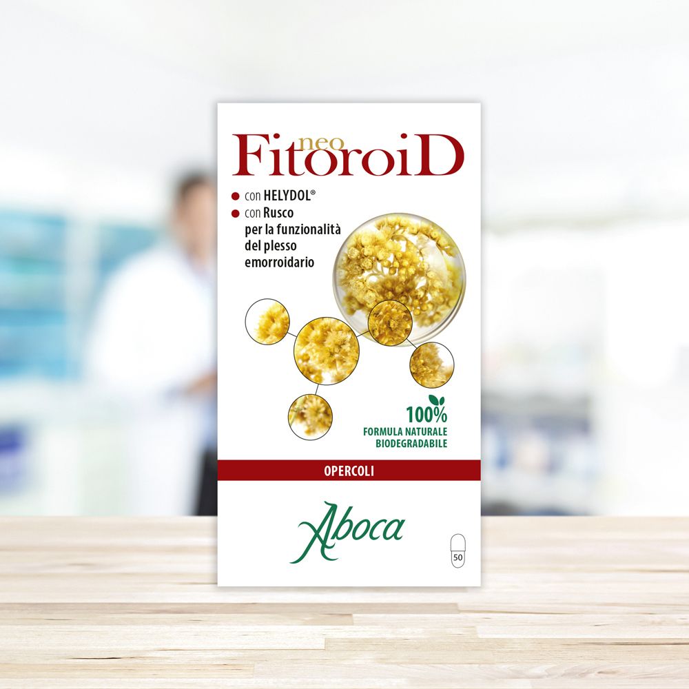 Confezione del prodotto con immagine del prodotto. Scritto: NeoFitoroid, con Helydol, con Rusco. Marchio: Aboca.