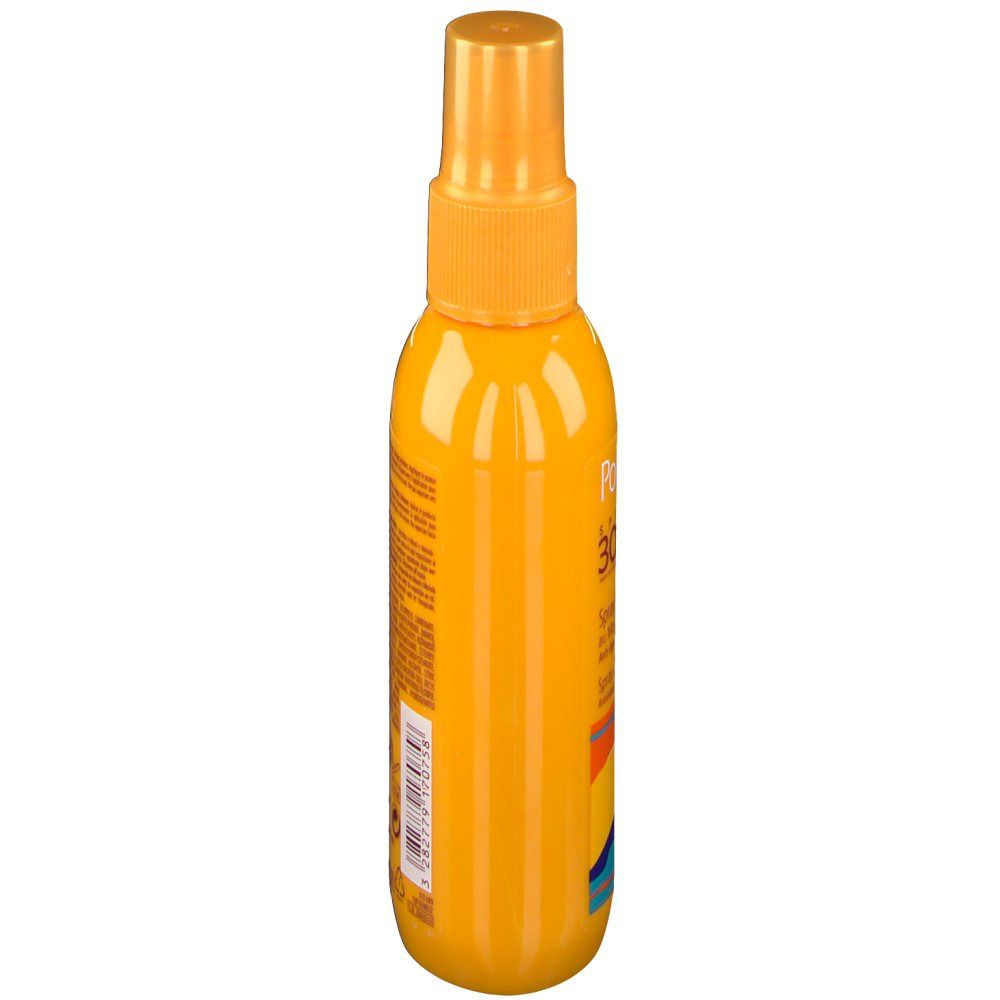 Flacone spray giallo, vista laterale. Testo e motivi a onde colorate. Scritta illeggibile.