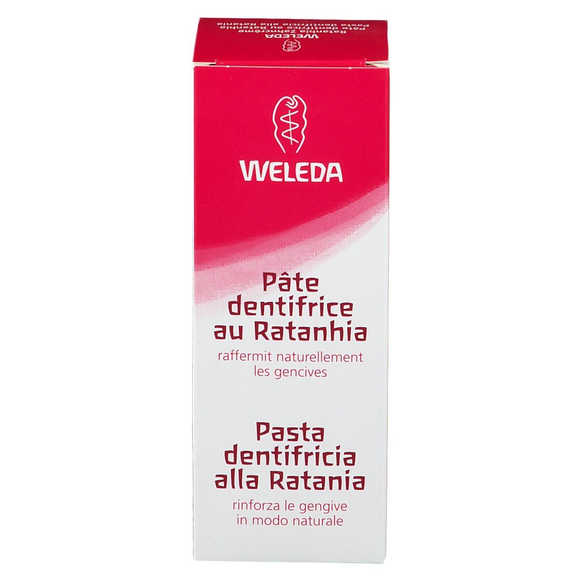 Scatola, rosa e bianca. Scritte: WELEDA, Pâte dentifrice au Ratanhia, Pasta dentifricia alla Ratania.