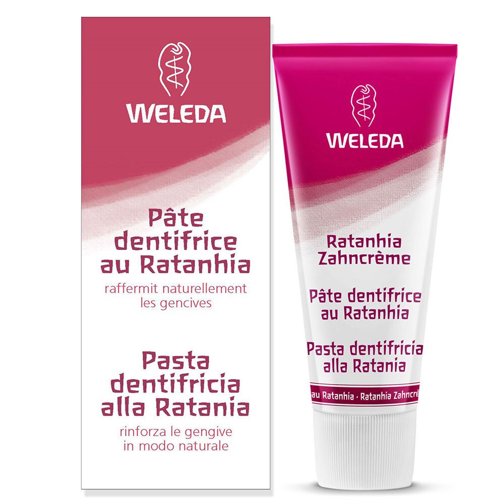 Tubo di dentifricio e scatola. Scritte: WELEDA, Pâte dentifrice au Ratanhia, Pasta dentifricia alla Ratania. Scatola: rosa, bianca.
