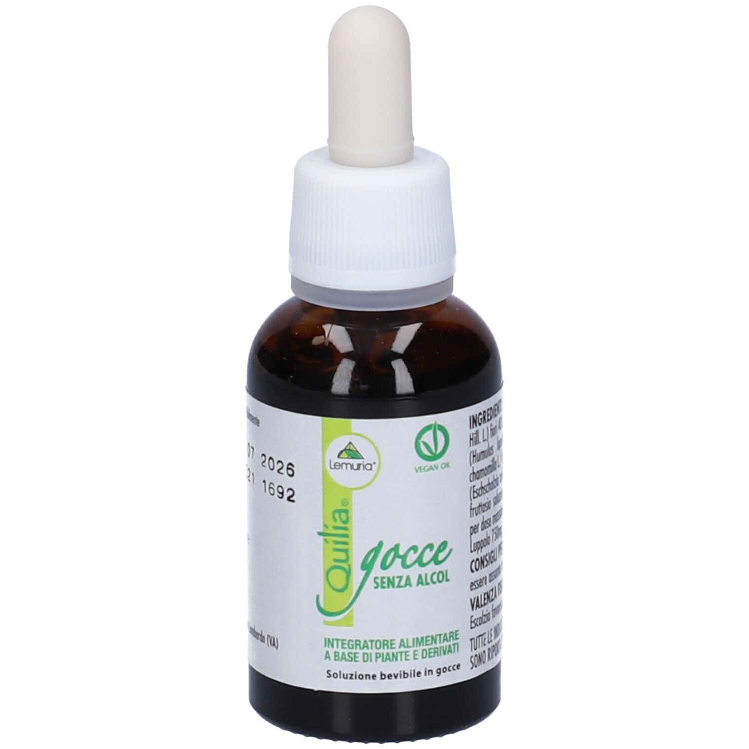 Flacone di vetro marrone con contagocce. Etichetta Quilia. Sigillo vegano. Contiene liquido. Tappo bianco.