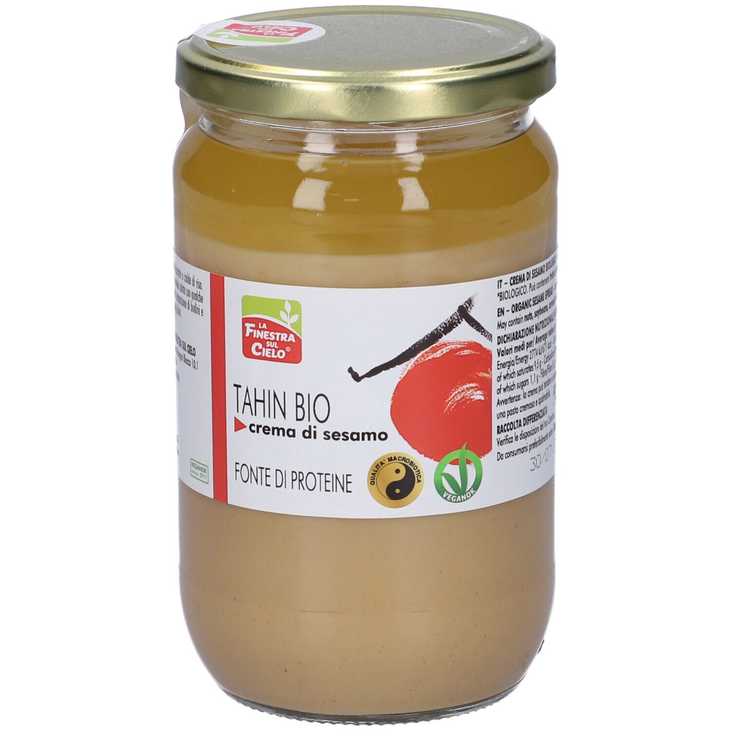 Vasetto di Tahin Bio, crema di sesamo. Etichetta con logo, testo e illustrazione. Coperchio dorato.