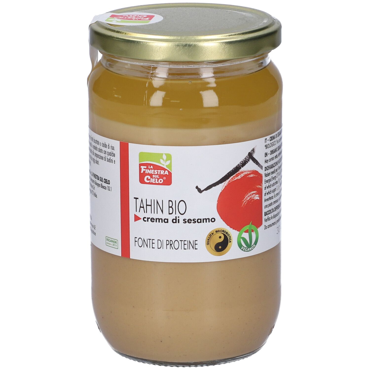 Vasetto di Tahin Bio, crema di sesamo. Etichetta con logo, testo e illustrazione. Coperchio dorato.