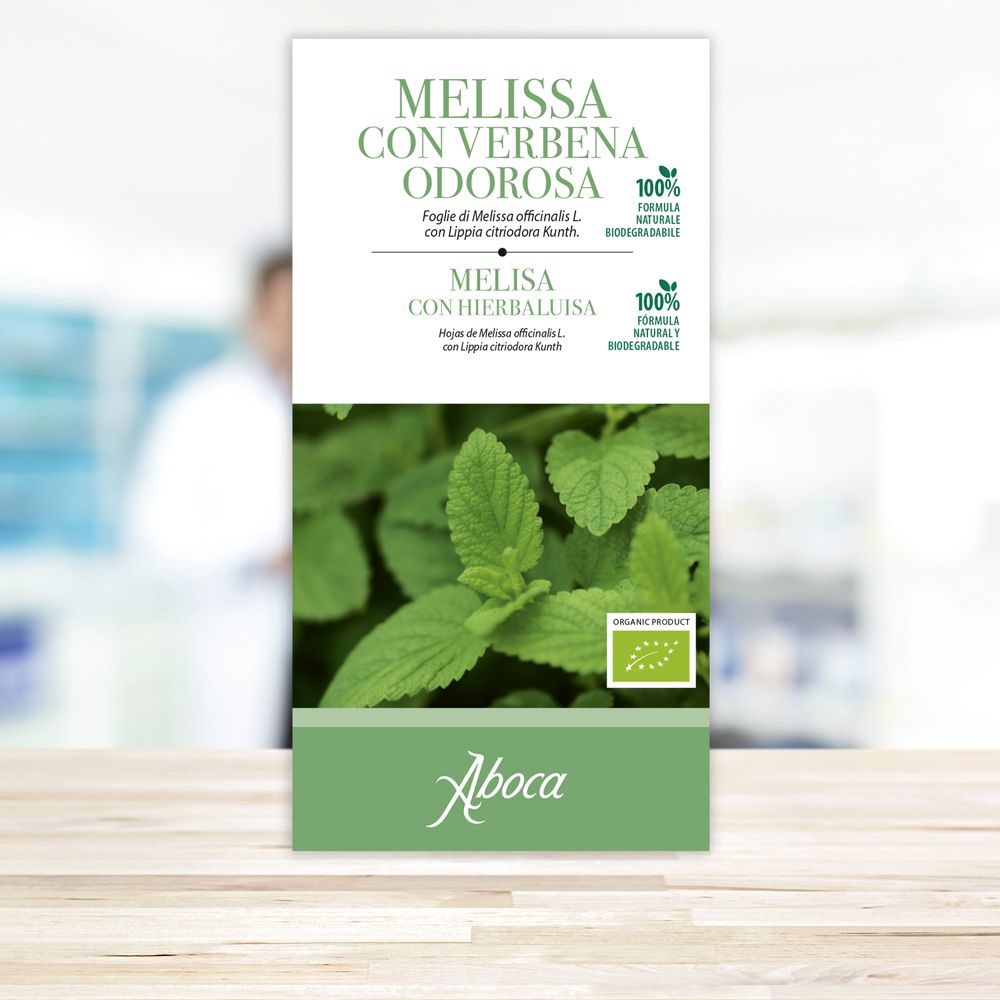 Confezione con testo e ingredienti. Testo: Melissa con Verbena Odorosa, 26 g. 100% naturale. Testo in italiano e spagnolo.
