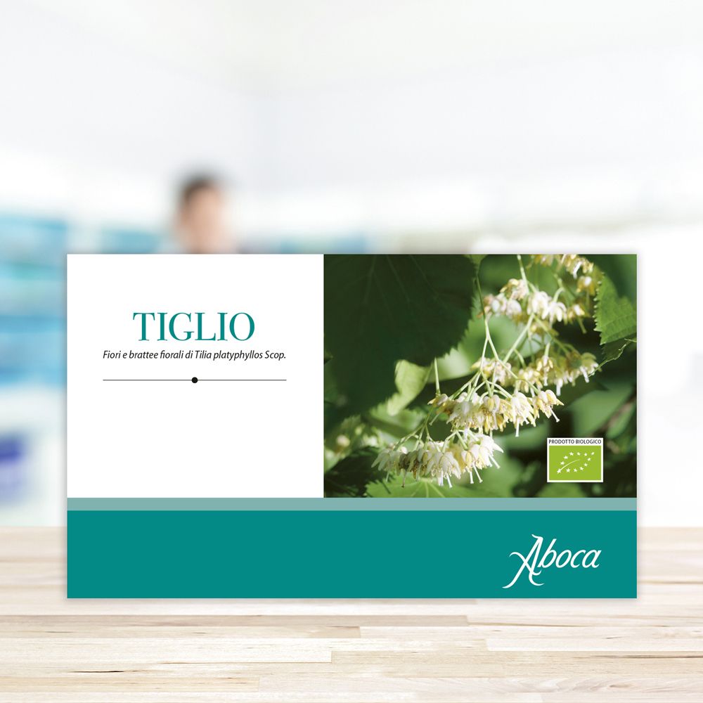 Confezione Tiglio, logo Aboca e marchio biologico. Immagine di fiori e foglie.