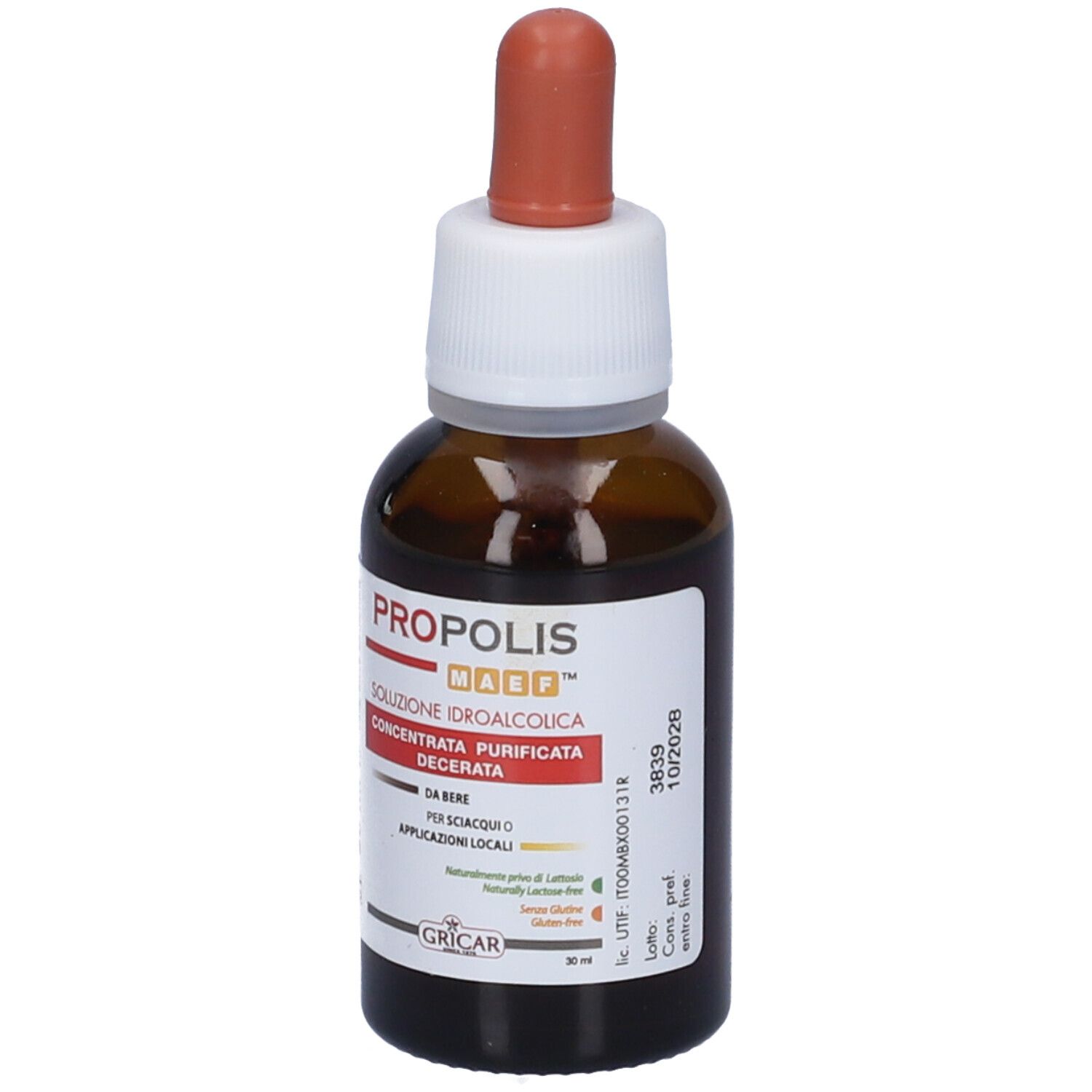 Flacone di vetro marrone con tappo bianco e contagocce marrone. Etichetta con informazioni sul prodotto. 30 ml.