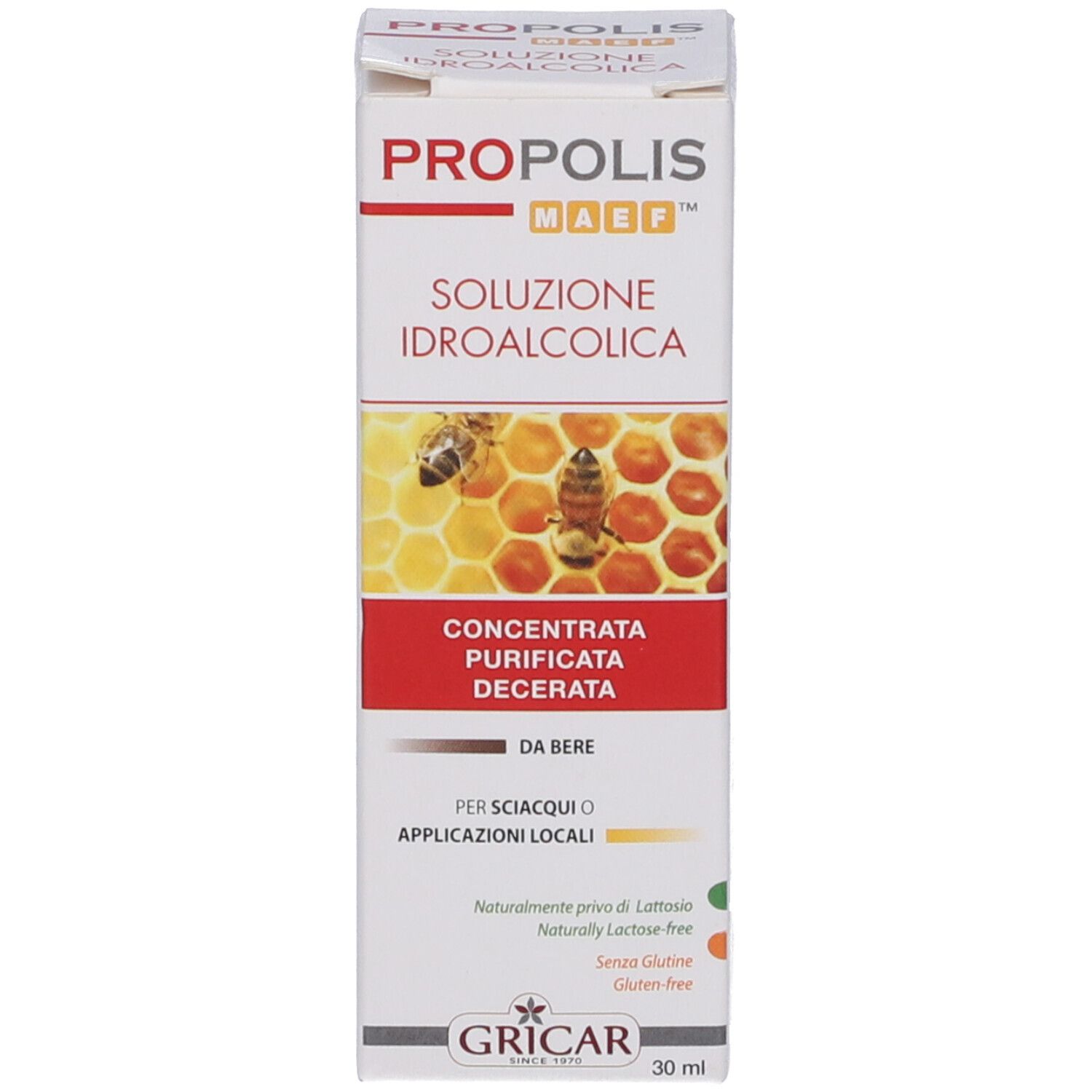 Scatola bianca con immagine e testo del prodotto. Flacone di vetro marrone con tappo bianco e contagocce marrone.