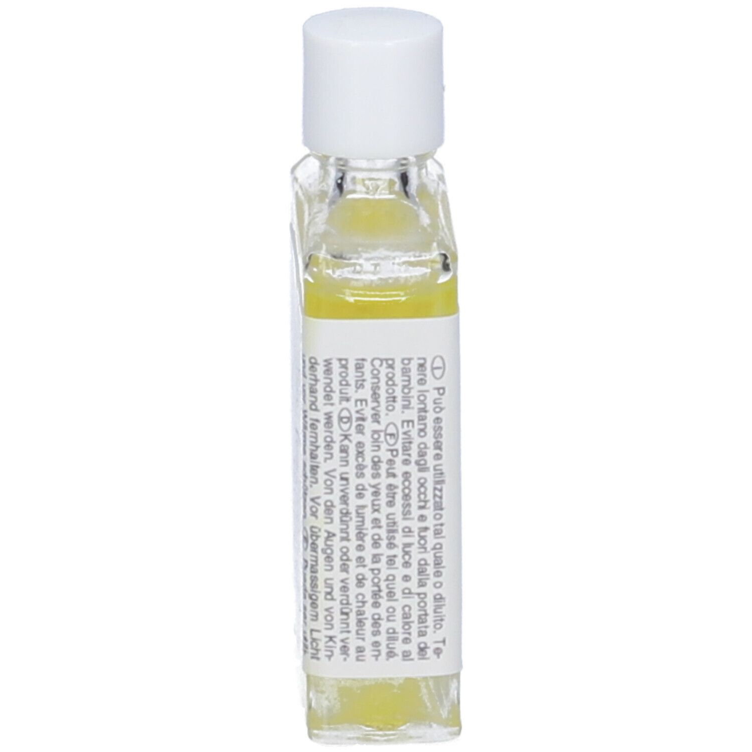 Olio trasparente in una piccola bottiglia rettangolare di vetro con tappo bianco. Etichetta con testo.