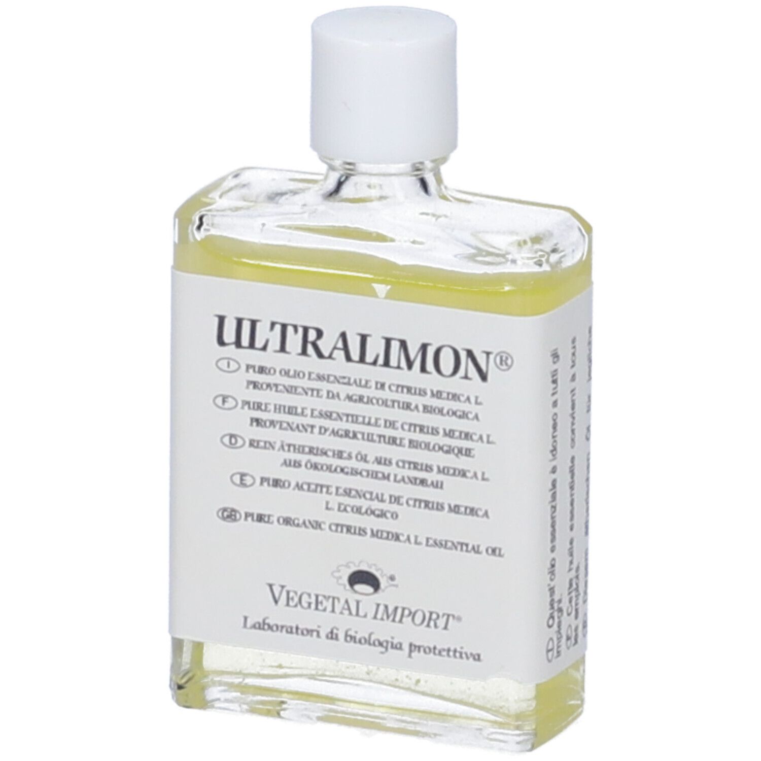 Olio trasparente in una bottiglia quadrata di vetro con tappo bianco. L'etichetta riporta 'Ultralimon' e altre informazioni.
