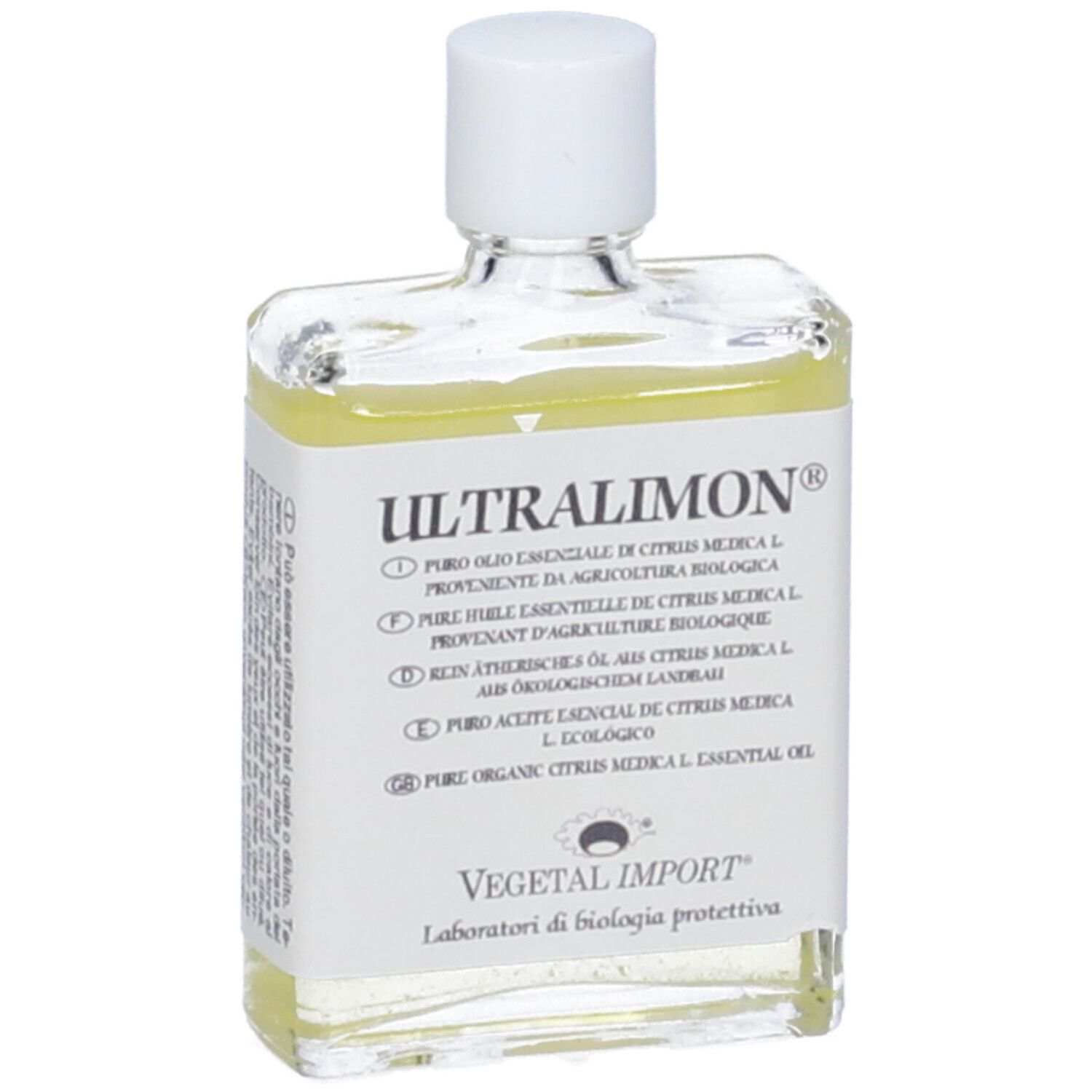 Olio trasparente in una bottiglia quadrata di vetro con tappo bianco. L'etichetta riporta 'Ultralimon' e altre informazioni.