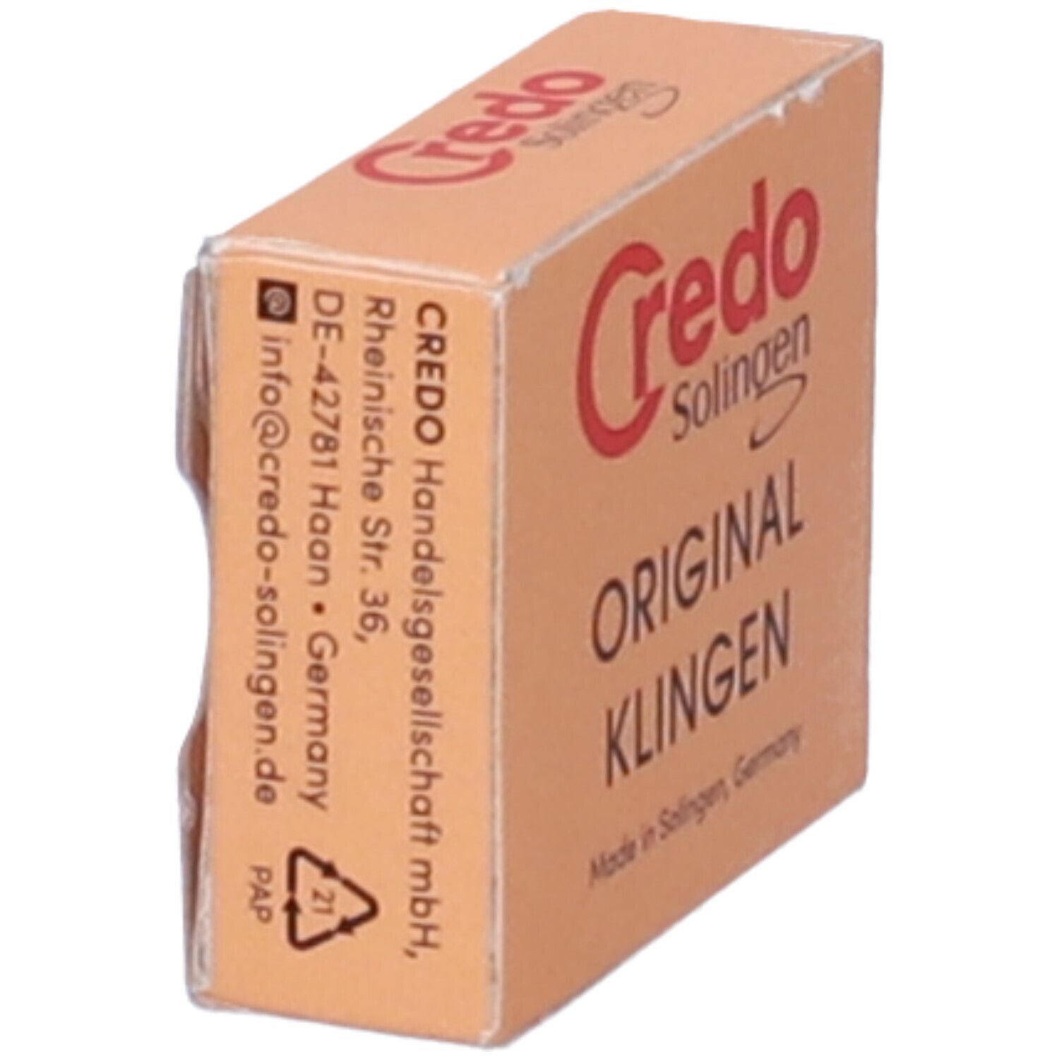 Scatola di cartone beige con logo Credo rosso e scritta "ORIGINAL KLINGEN". Indirizzo del produttore. Simbolo di riciclaggio.
